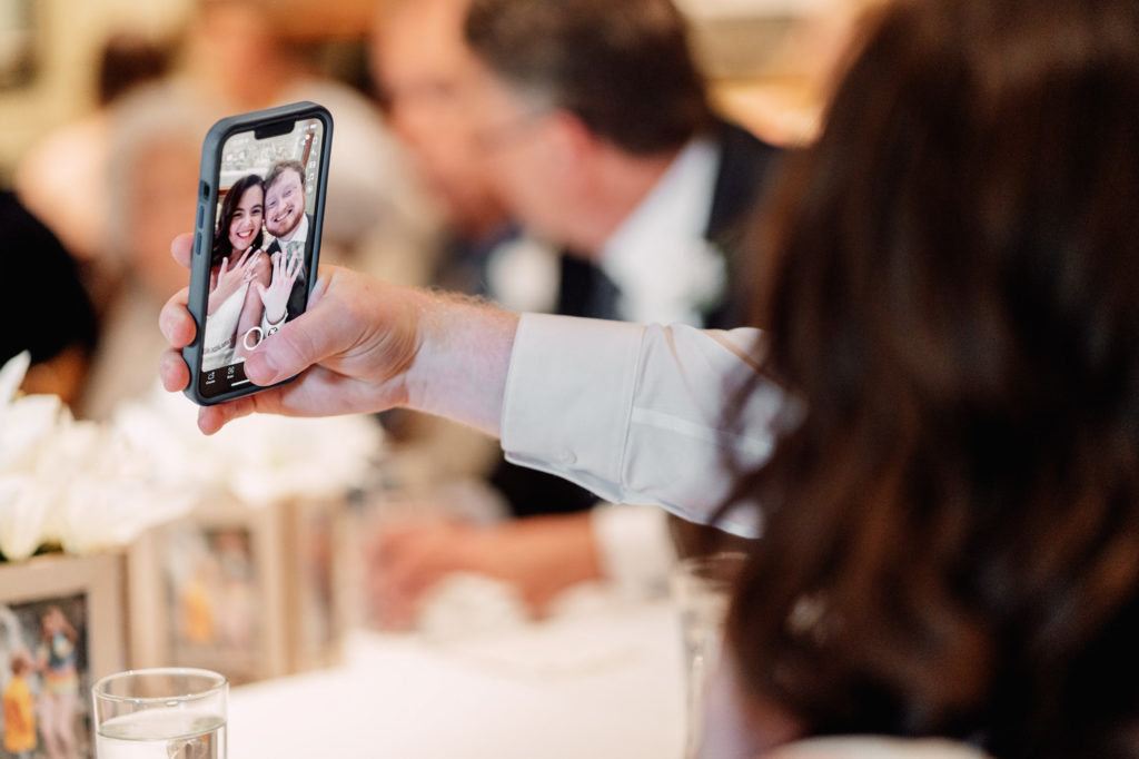bride and groom taking selfie during wedding reception at a Northern Virginia wedding