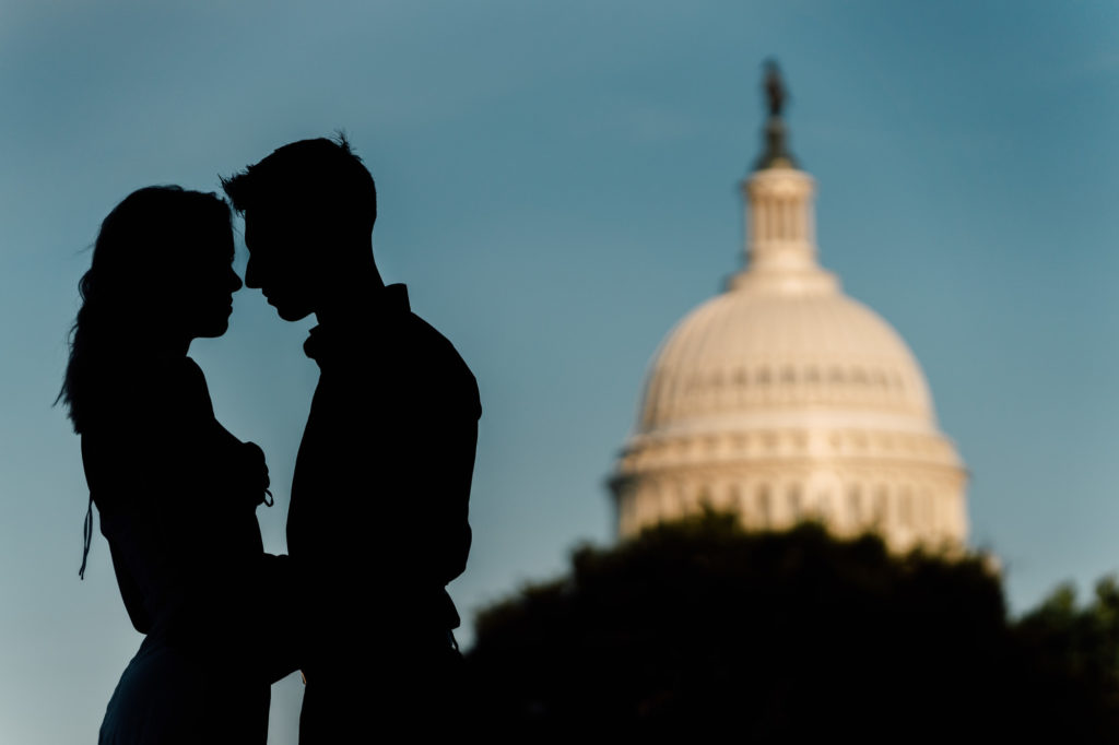 couples silhouette photo near the capitol building in washington dc