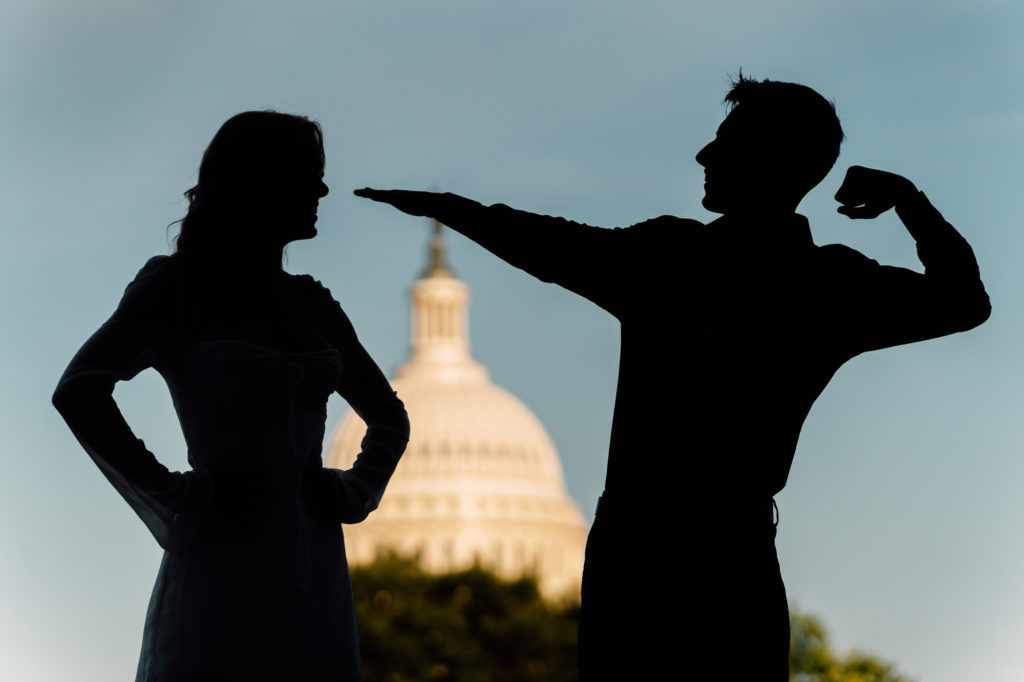 bride and groom fun silhouette image near the capitol building in Washington dc