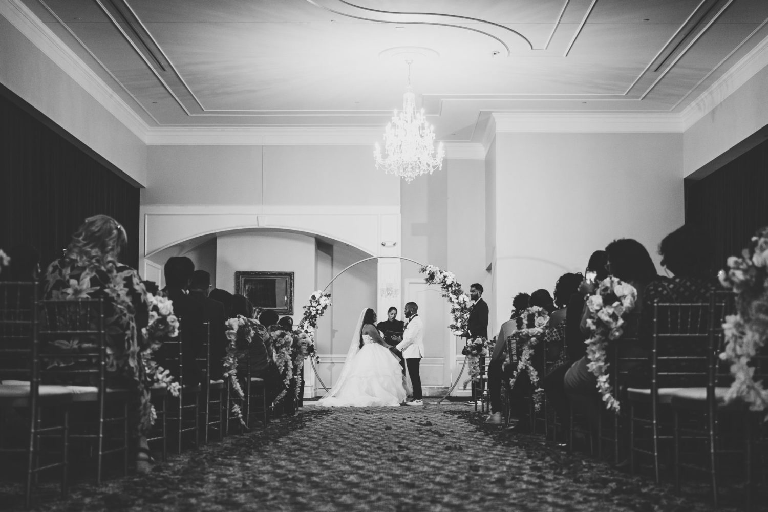 bride and groom exchange vows on their Foxchase manor wedding day