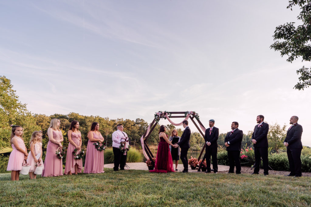 wide photo of the wedding party during a wedding ceremony in winchester virginia