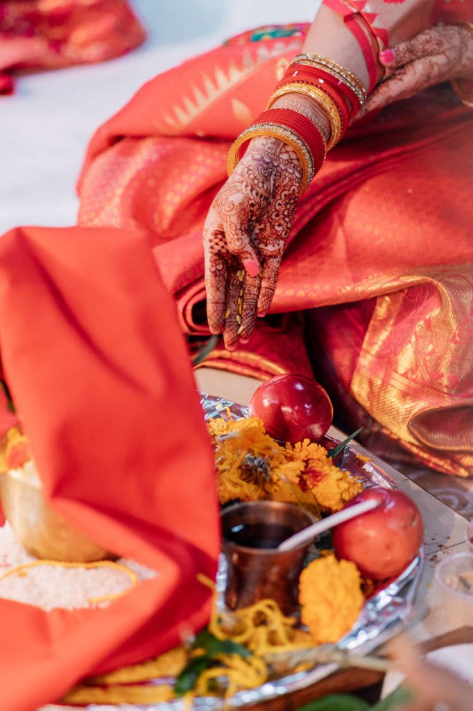 indian bride embracing cultural wedding tradition