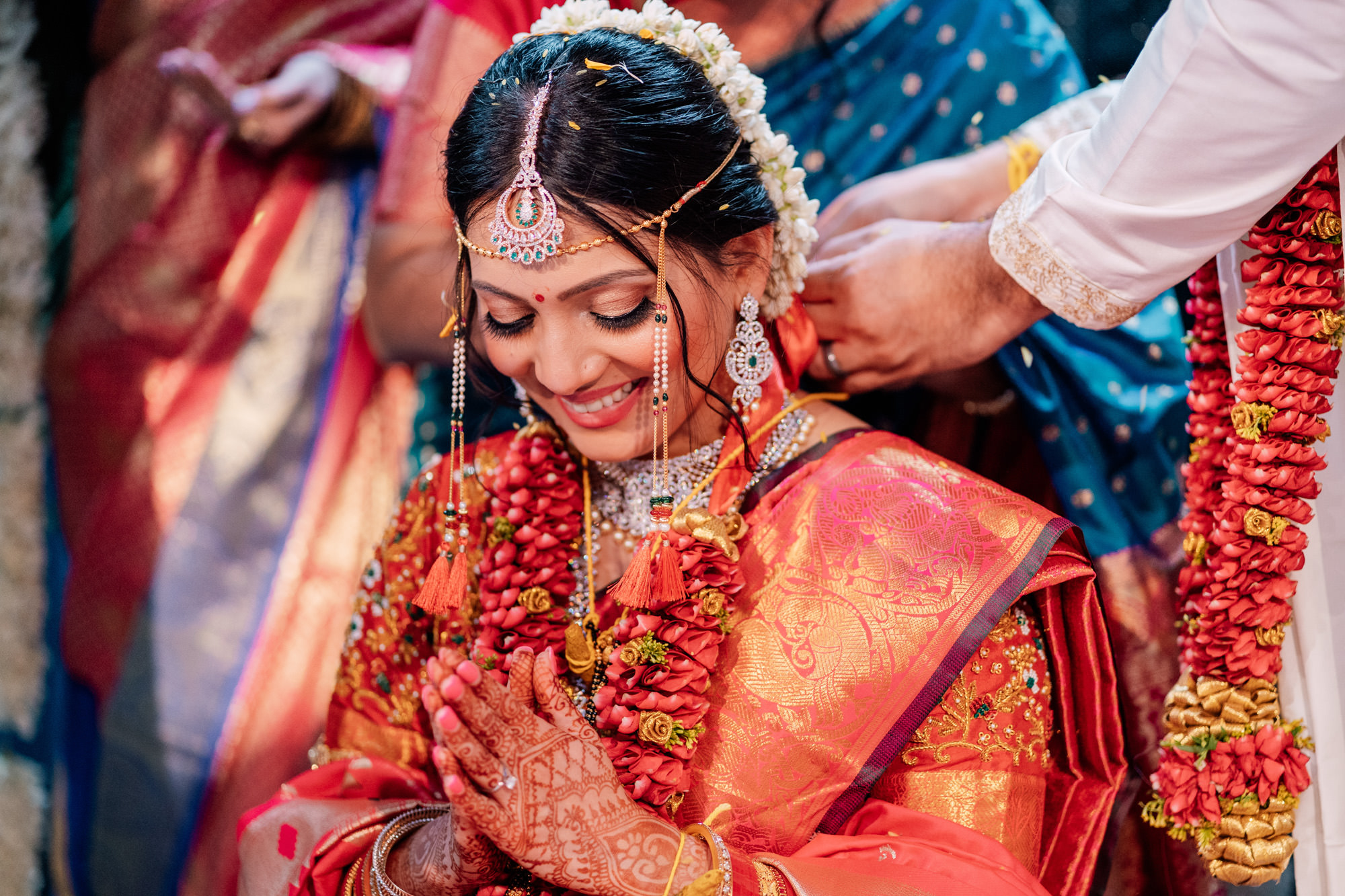 bride smiling during indian wedding ceremony
