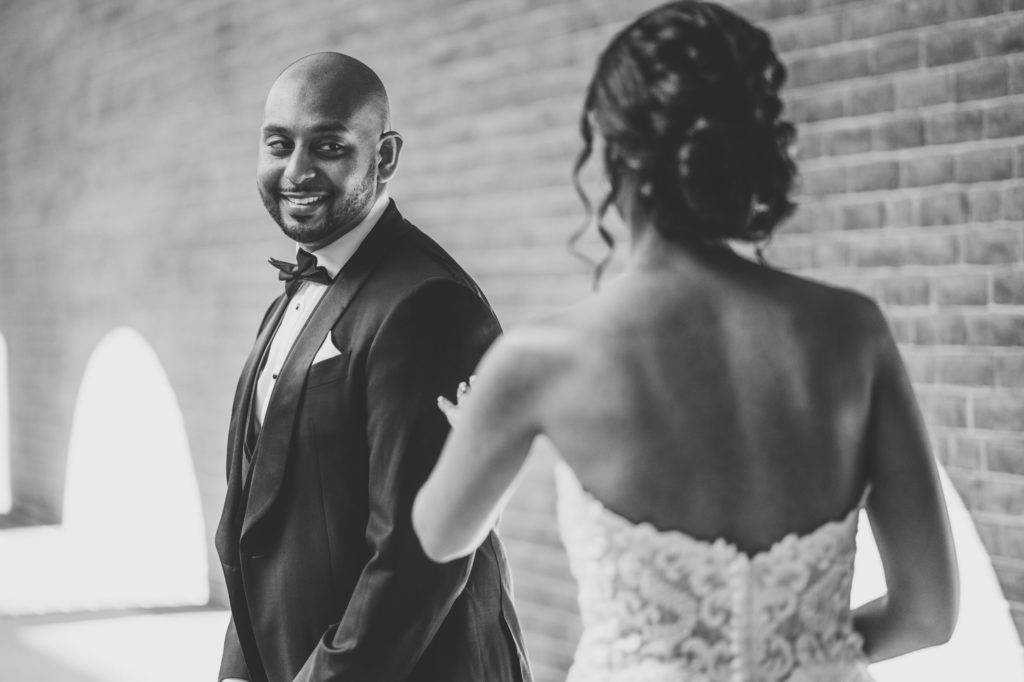 groom reacting to first look with bride