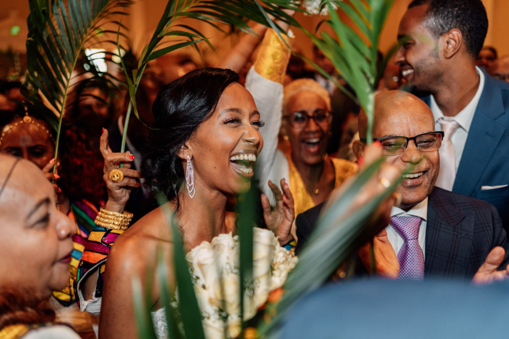 bride having fun and laughing with guest during open dance floor at a Maryland wedding