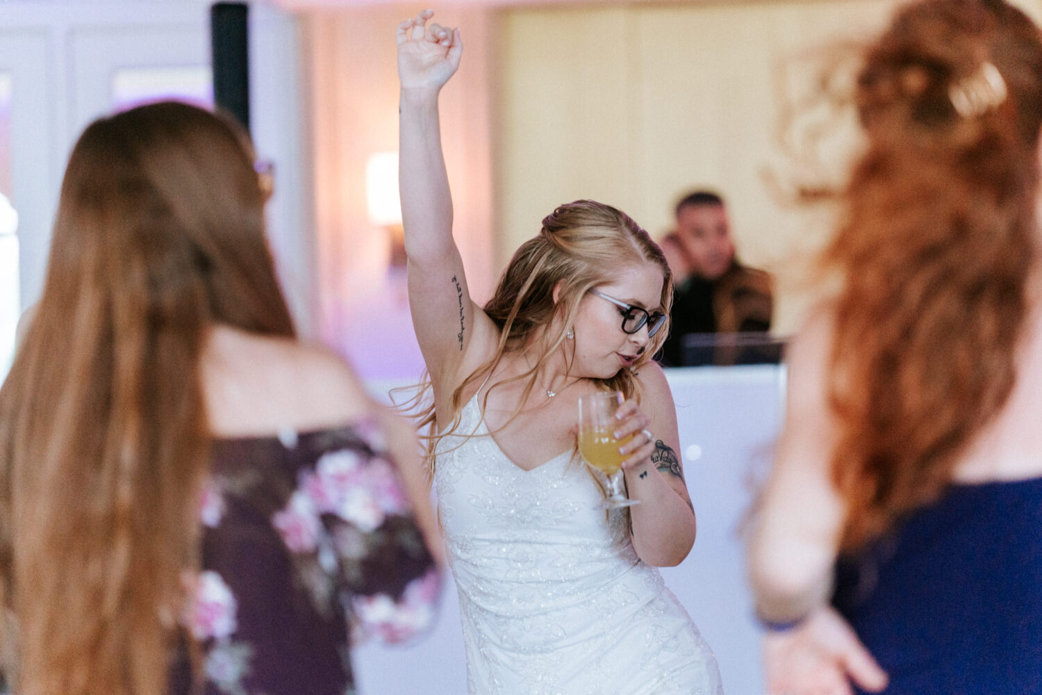bride having fun and dancing on her Chesapeake inn wedding day