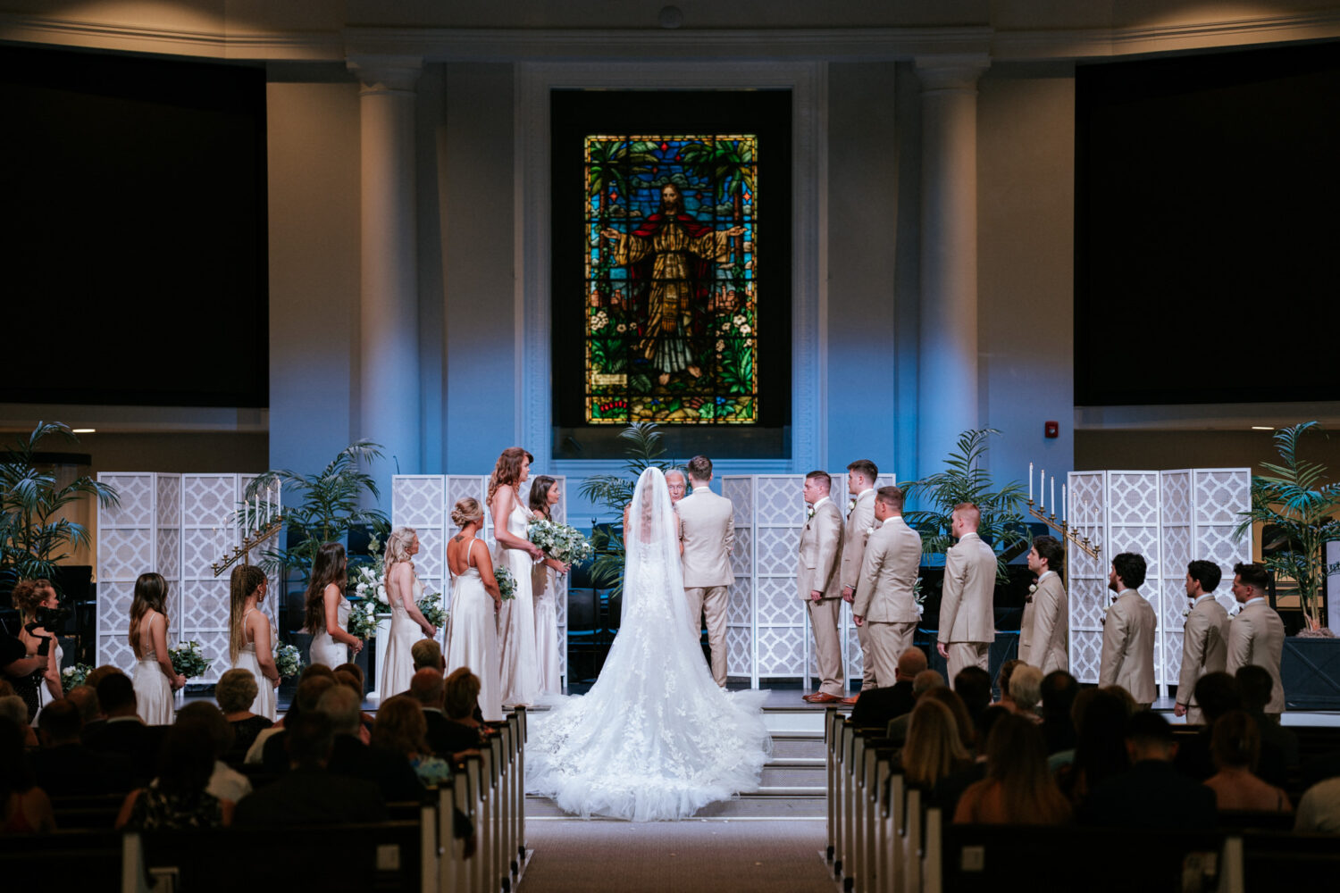 bride and groom at the altar on their wedding day in alexandria virginia