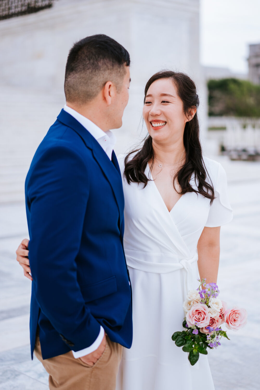 bride looking at groom and smiling during their washington dc engagement session