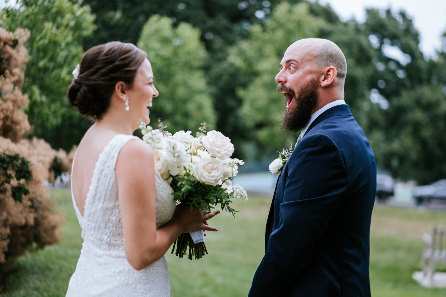 groom reacts to seeing bride for the first time on their wedding day