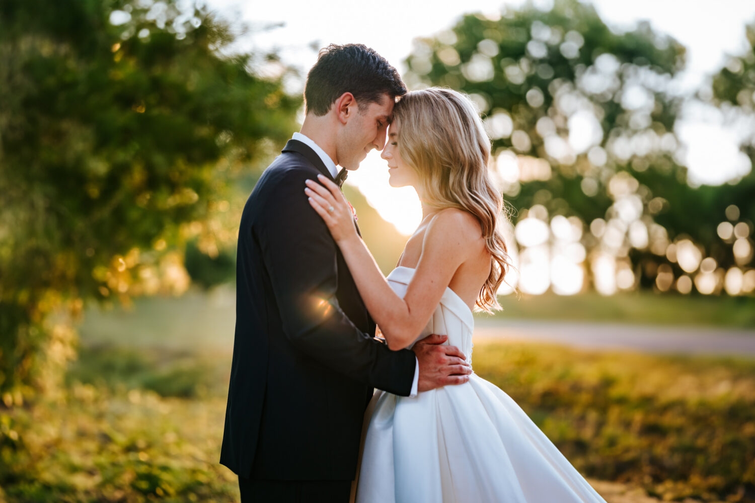 bride and groom together during their sunset portrait session