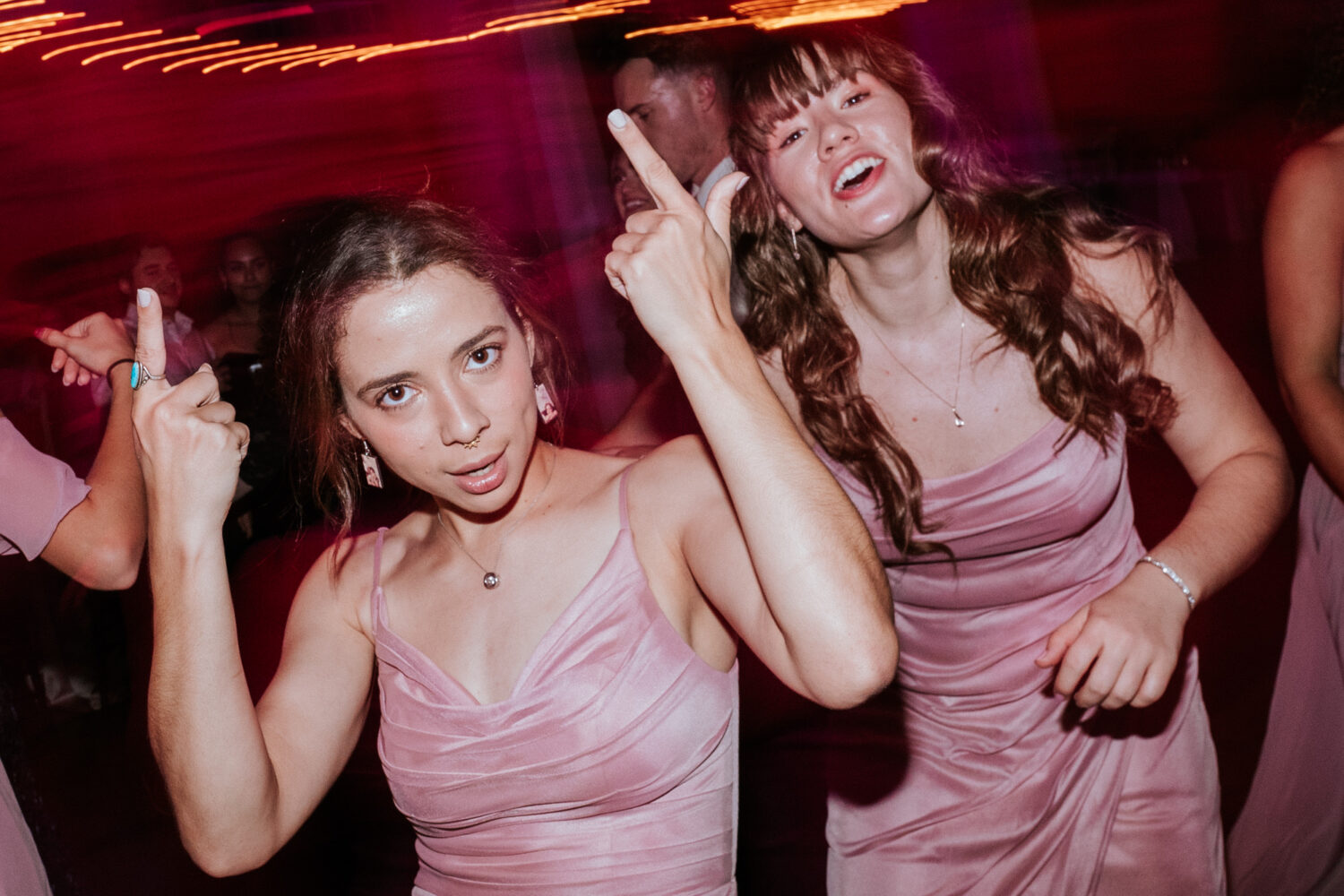 bridesmaids having fun on the dance floor together