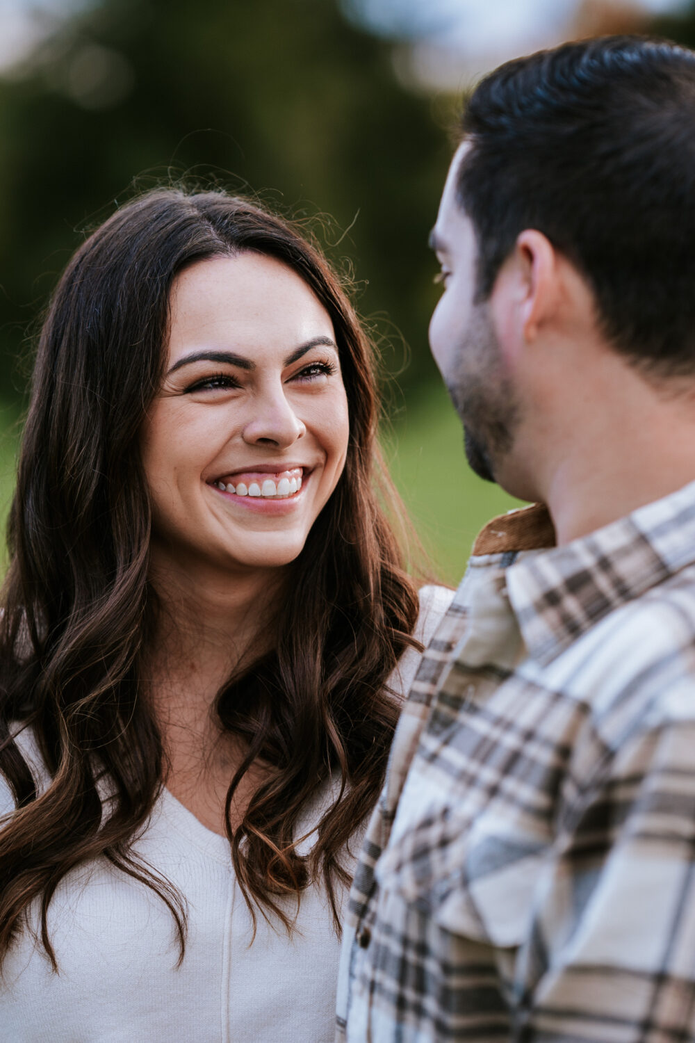 girl smiling and laughing with her fiance