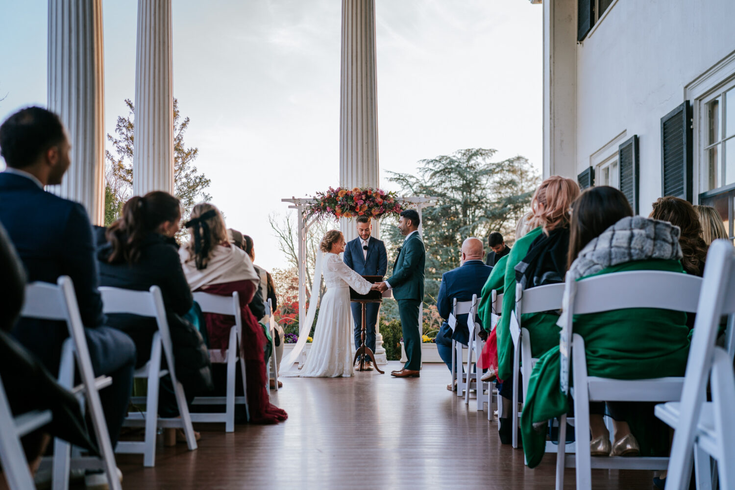 bride and groom at the altar together on their historic rosemont manor wedding day