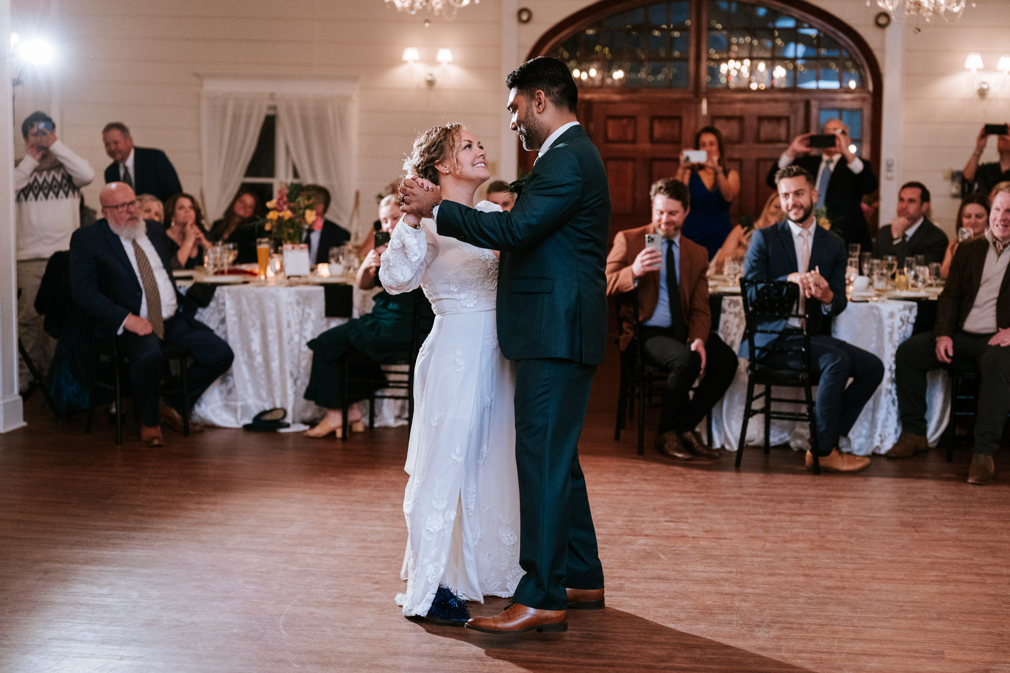 bride and groom dancing together on their wedding day at the rosemont manor