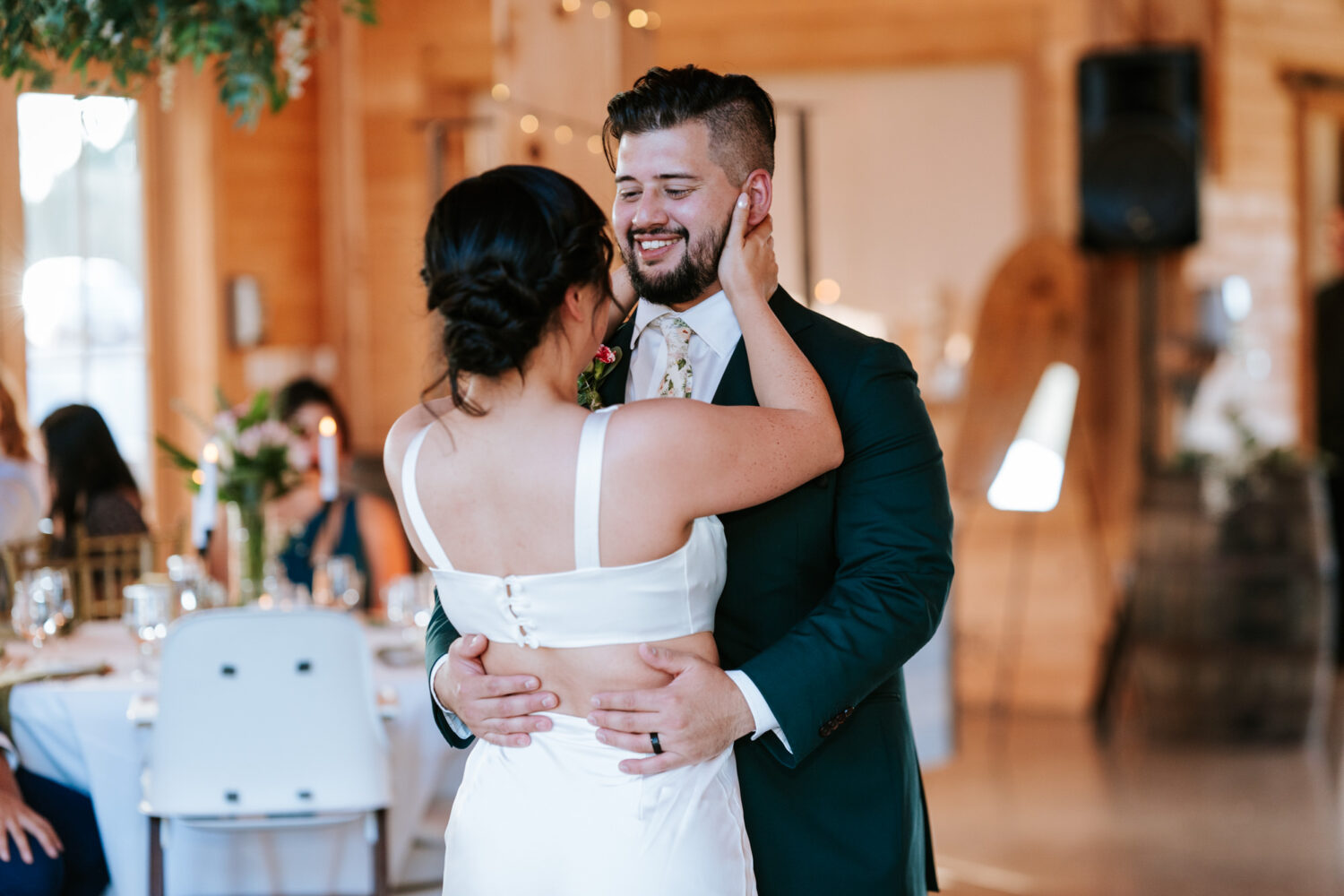 bride and groom sharing their first dance as a married couple