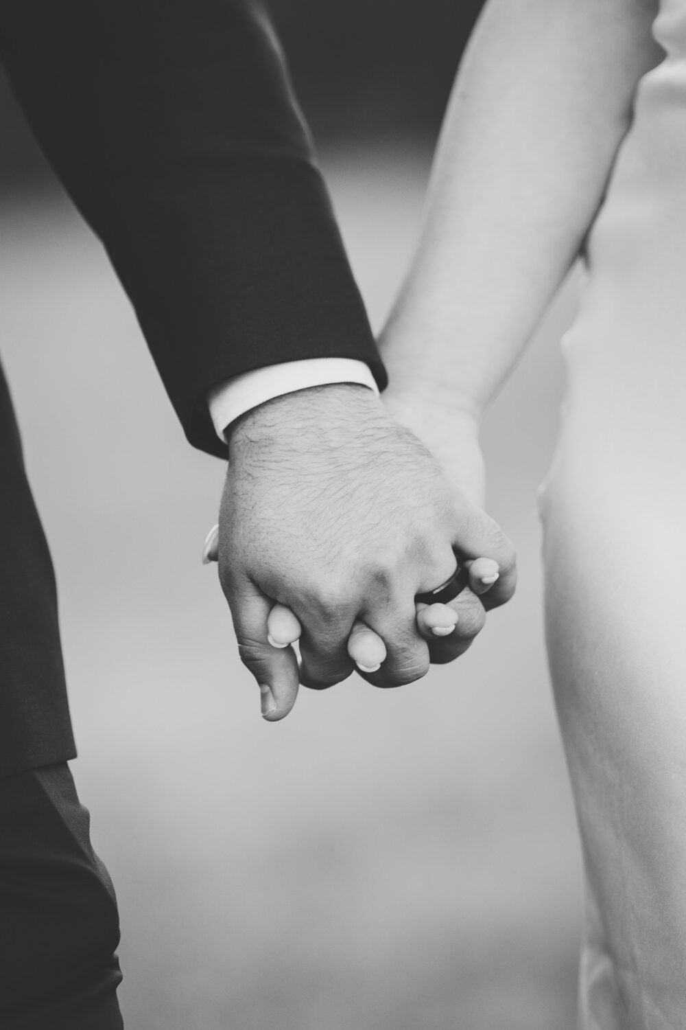 bride and groom holding hands during their willow brook wedding day in leesburg, virginia