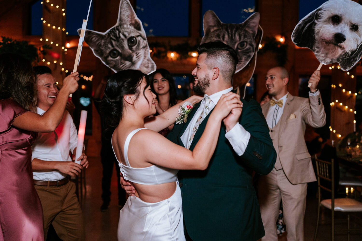 bride and groom dancing with their guests