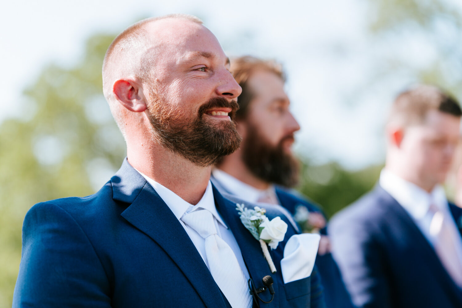 groom reacting to seeing bride for the first time on their wedding day
