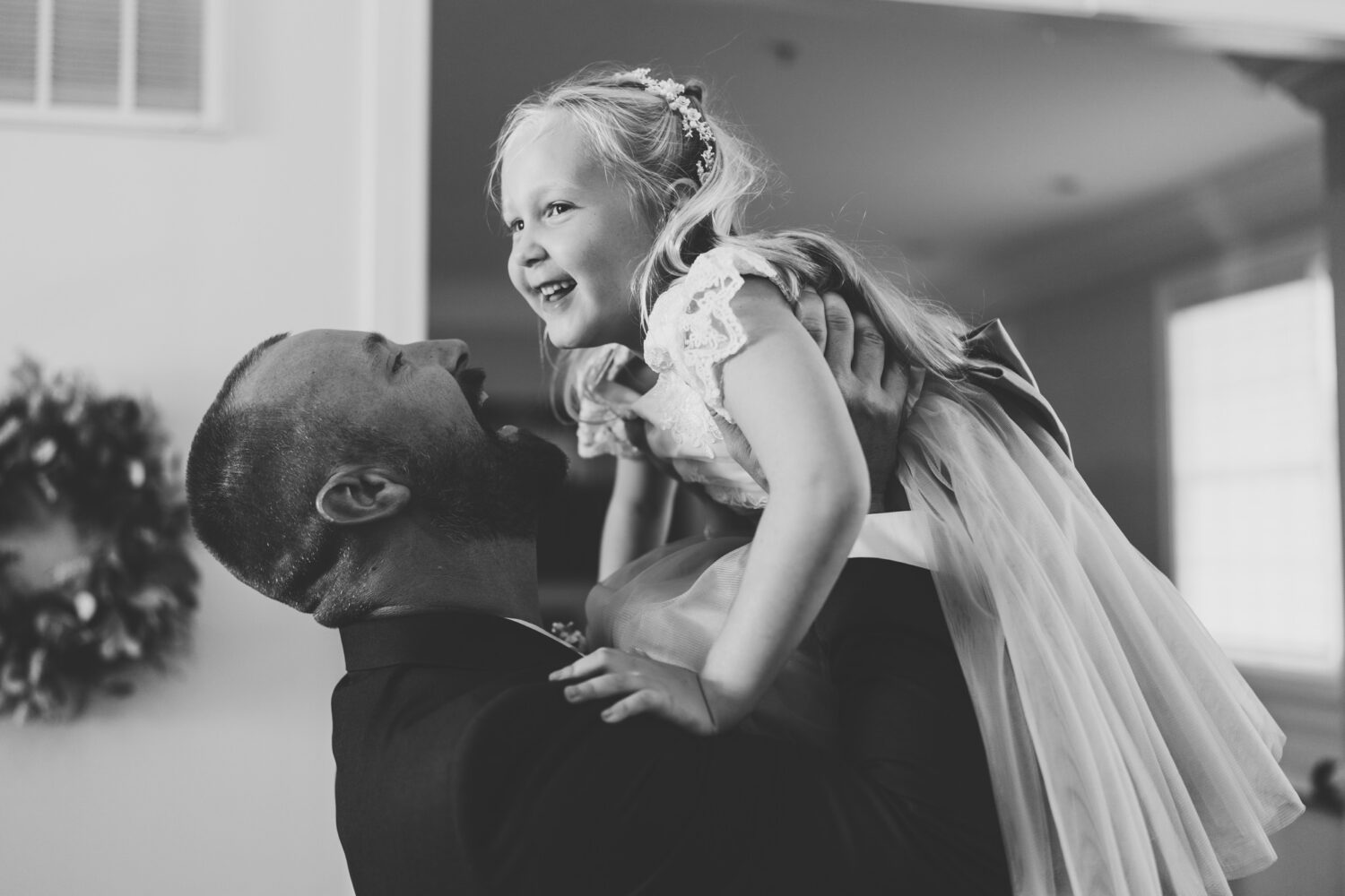 groom celebrating his recent marriage with his daughter