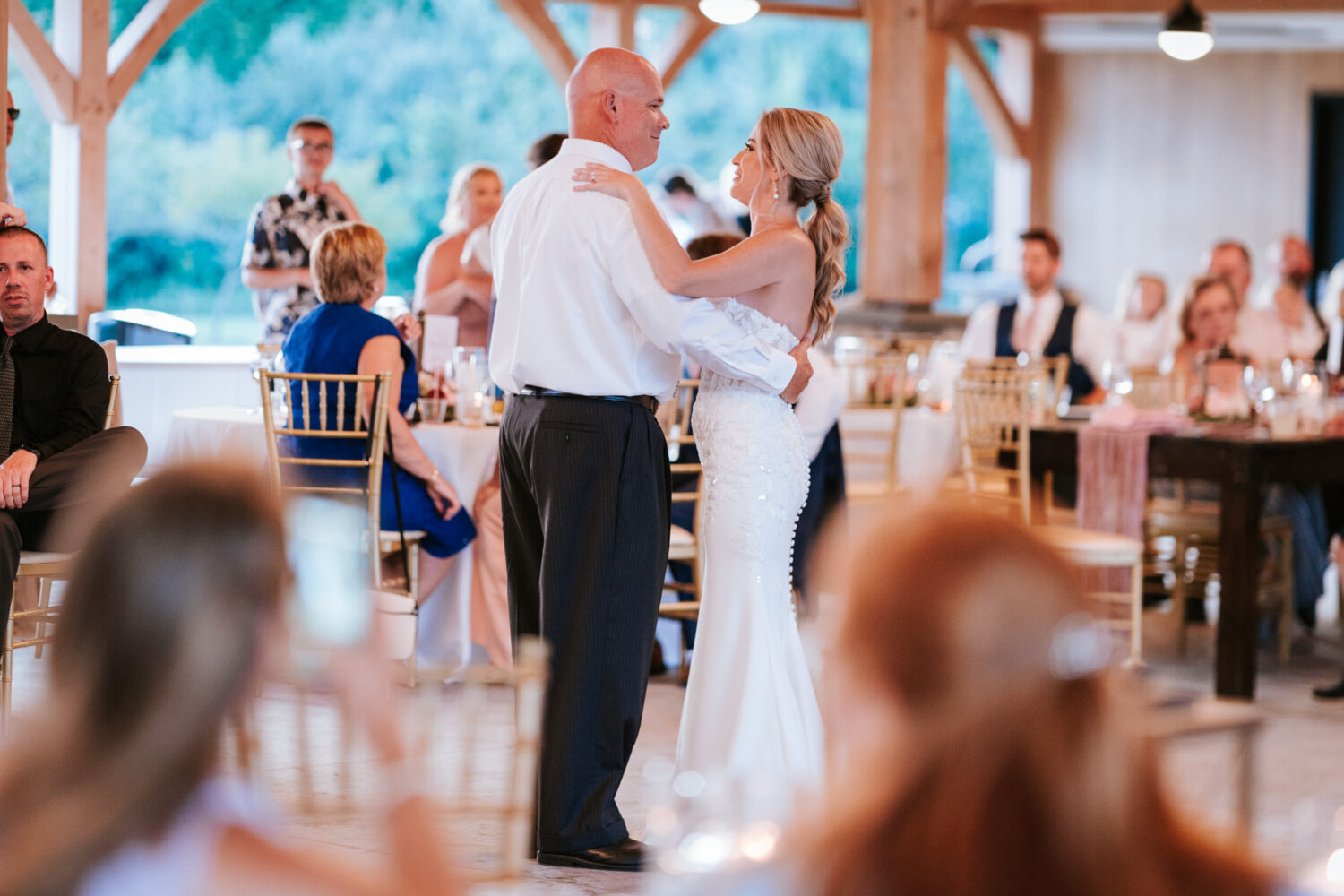 bride and her father having their father-daughter dance on her wedding day