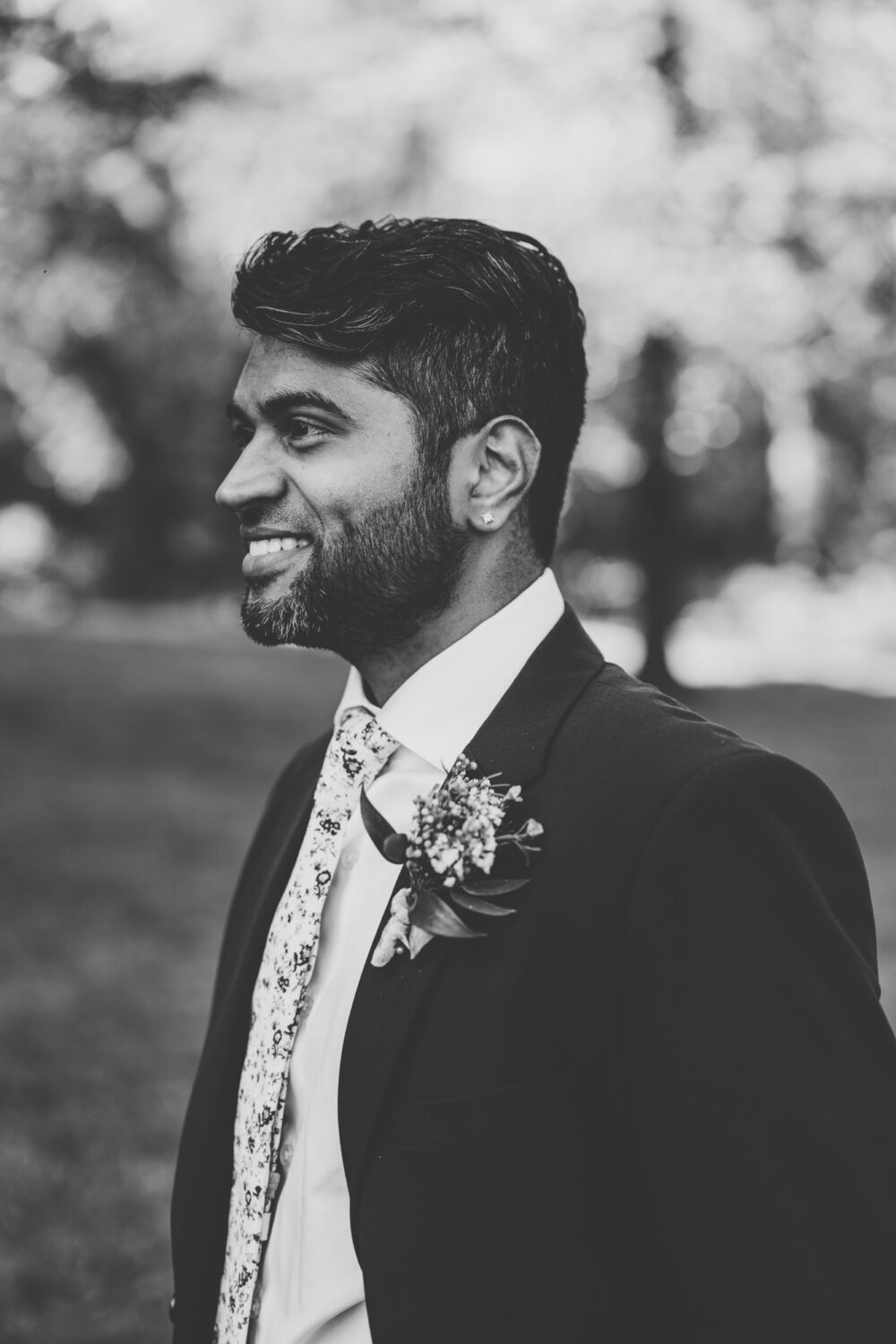 portrait of groom during his wedding day