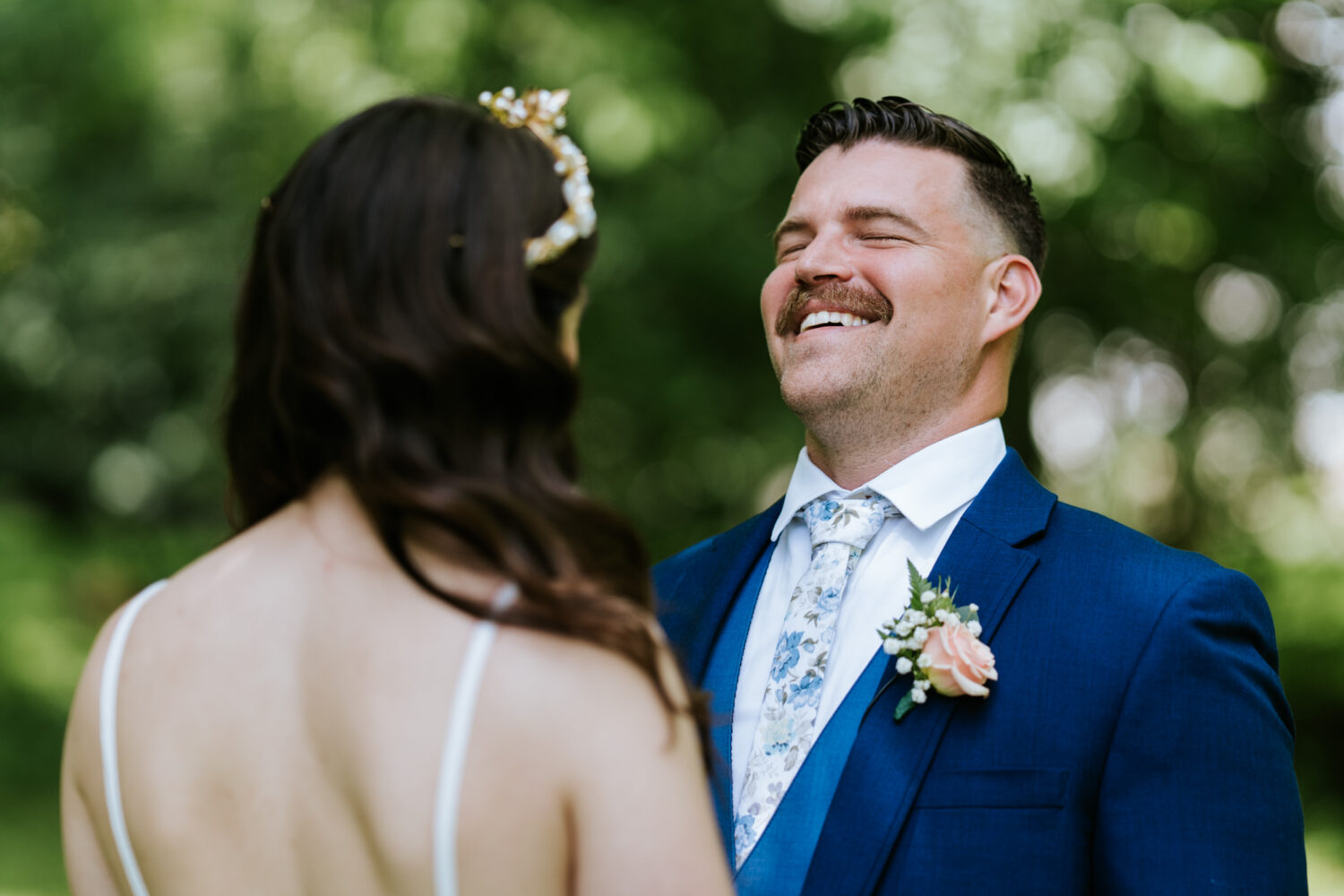 groom reacting to see his bride for the first time on their historic rosemont springs wedding day