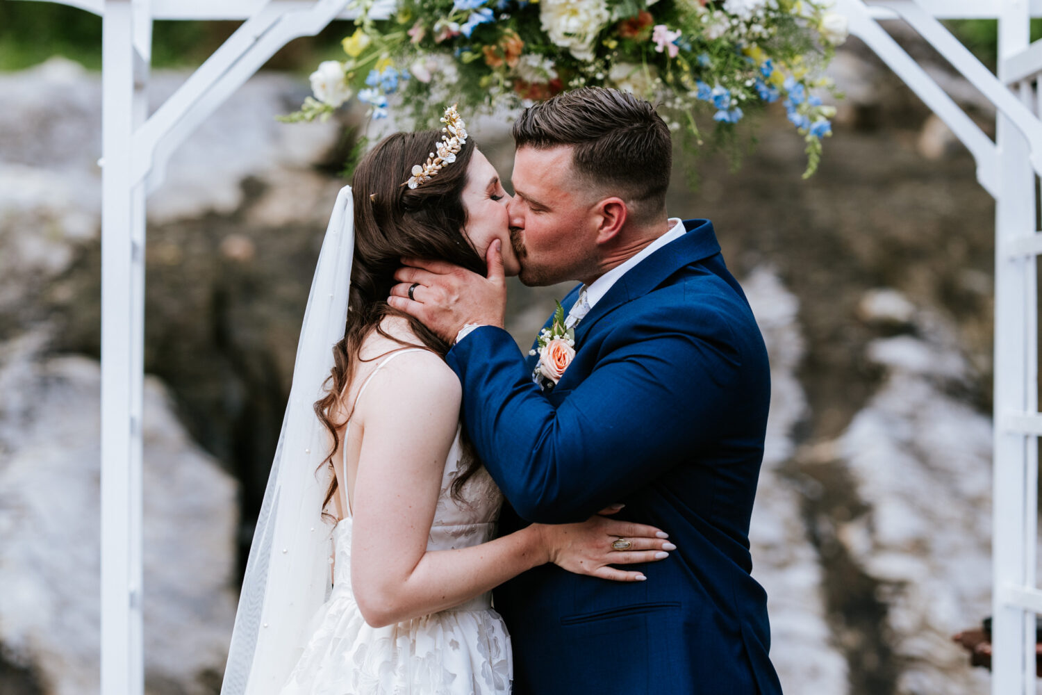 bride and groom first kiss during their historic rosemont springs wedding