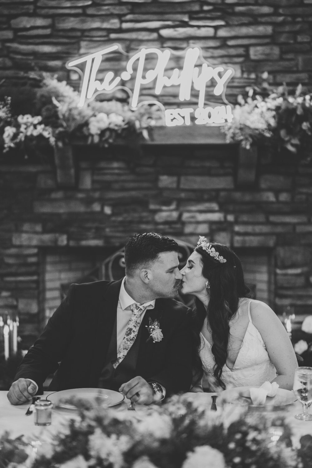 bride and groom kiss during their historic rosemont springs wedding reception