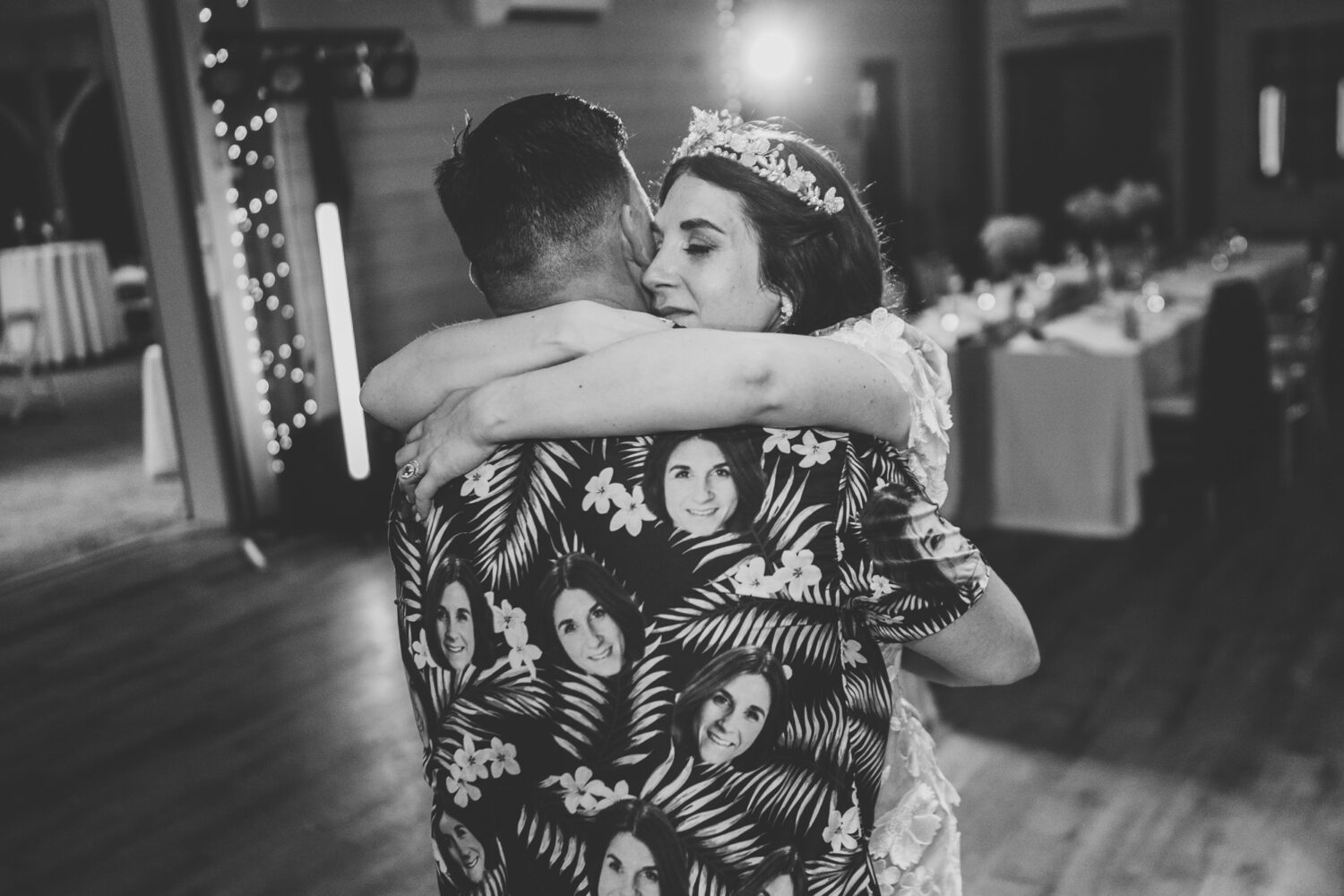 bride and groom hugging at the end of their private last dance