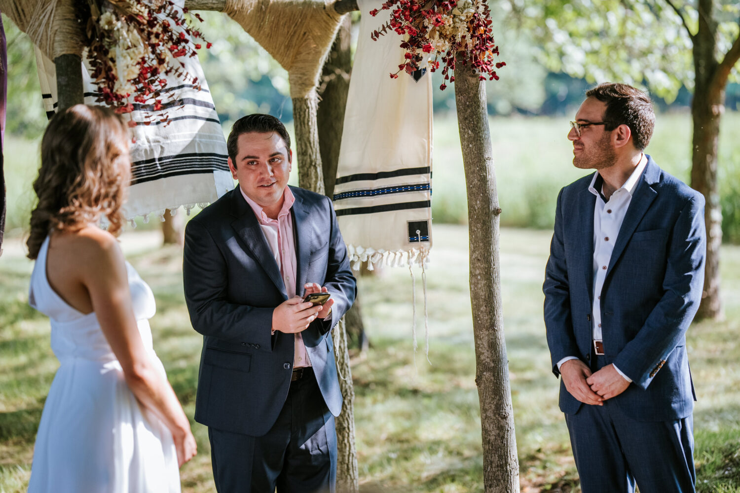 brother of the groom giving a speech at their intimate wedding ceremony