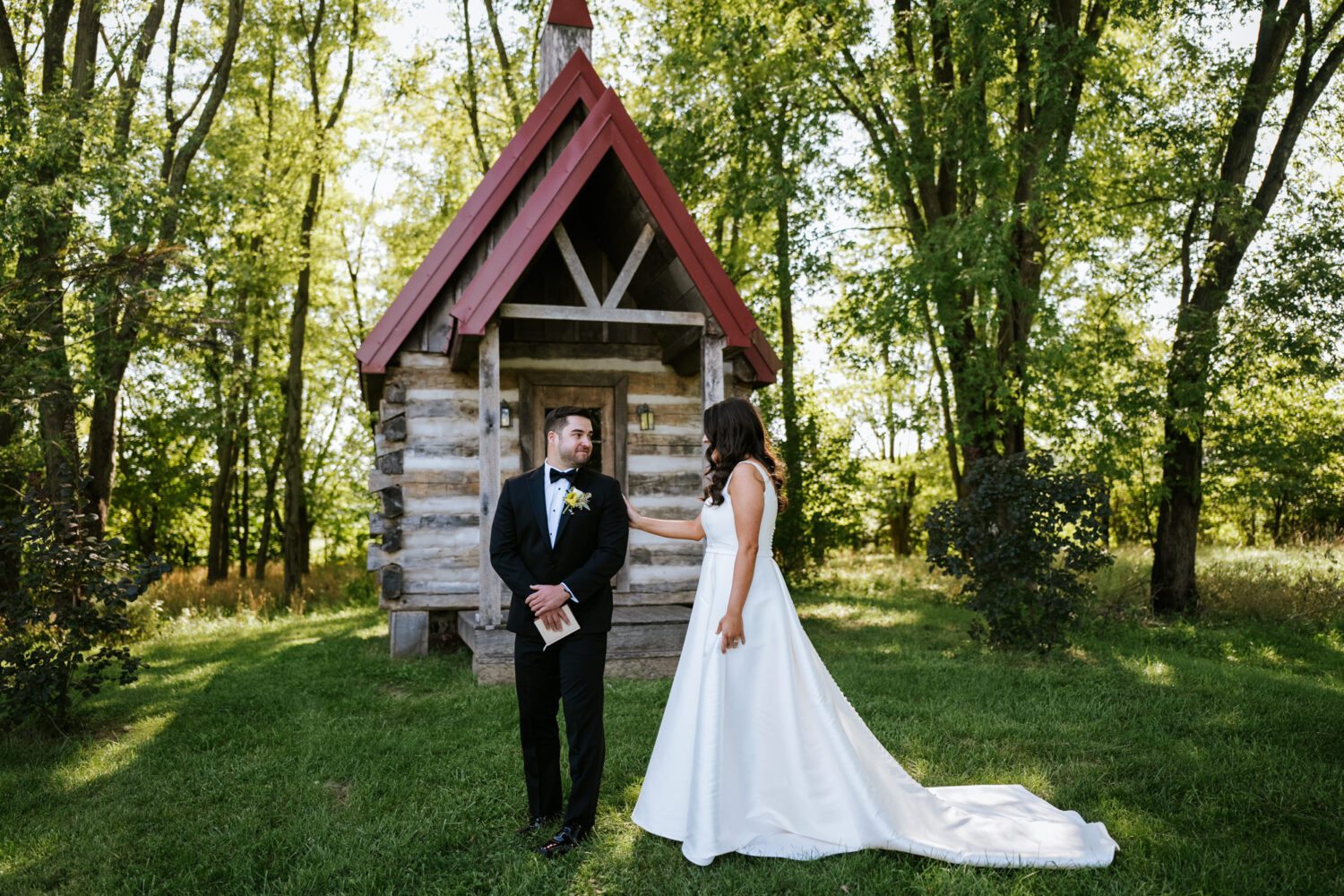 groom turning around to see his bride for the first time on their wedding day