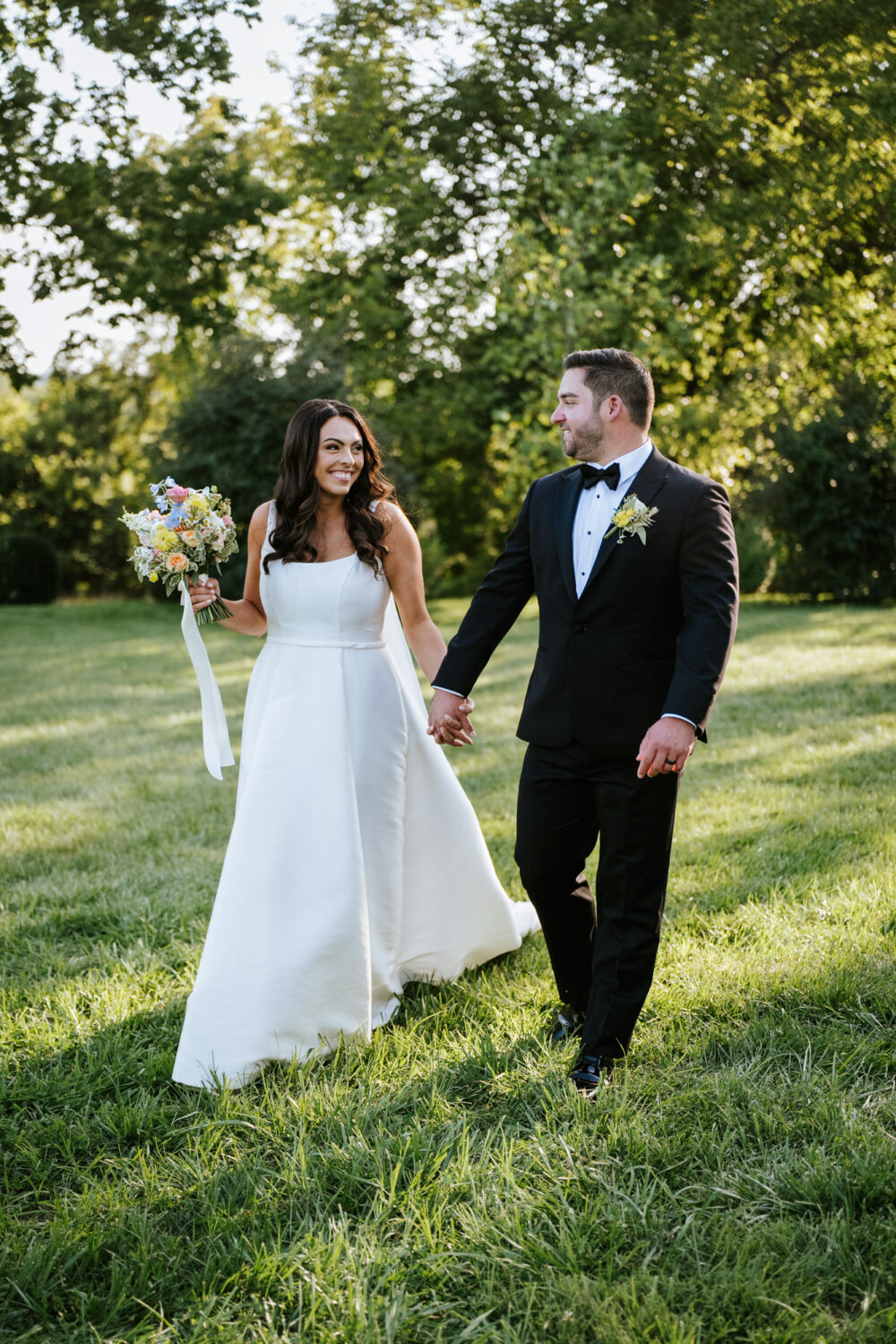 bride and groom walking together on their wedding day