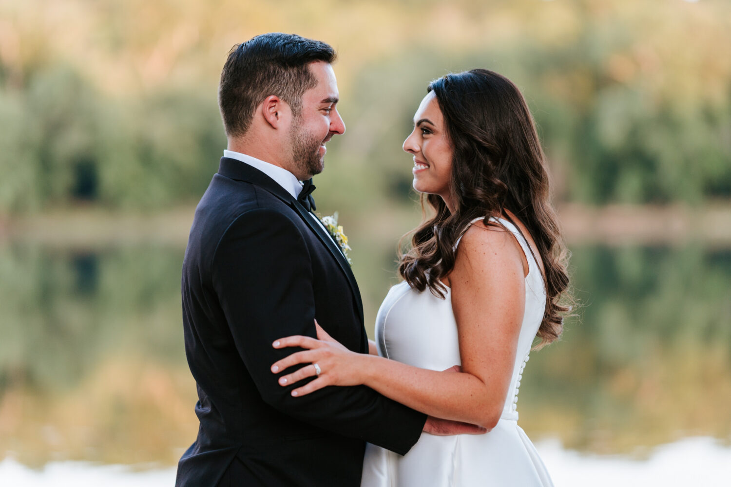 bride and groom portrait with trees in the background