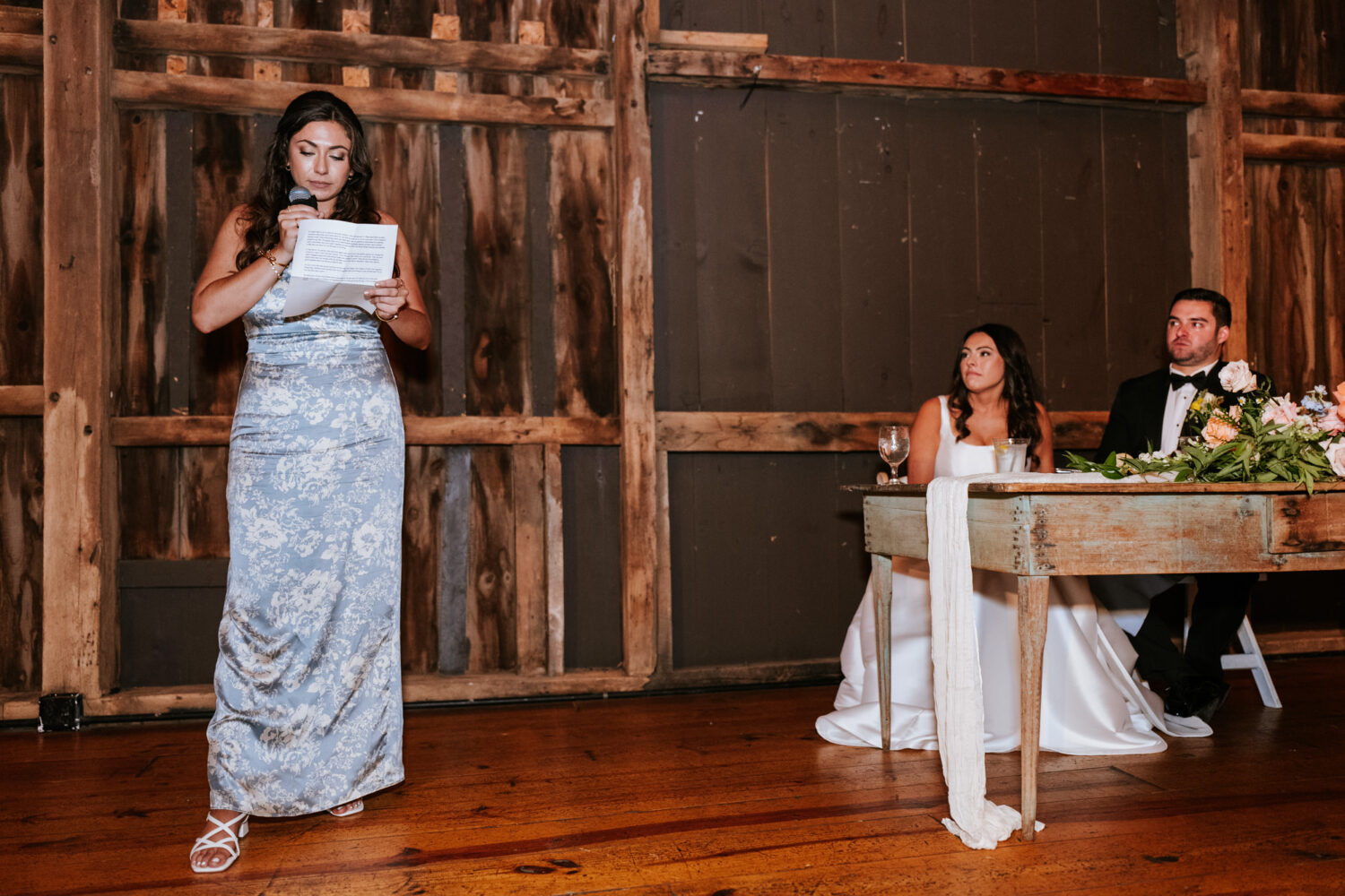 sister of the bride giving an emotional wedding speech