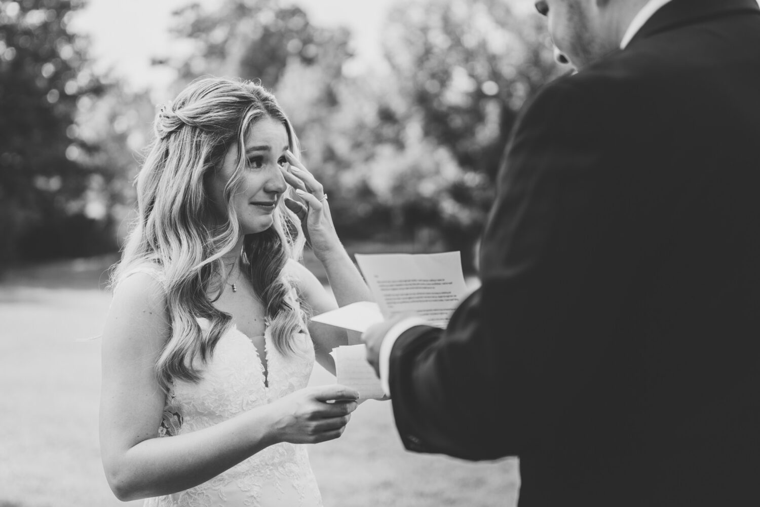 bride crying after reading her groom's letter