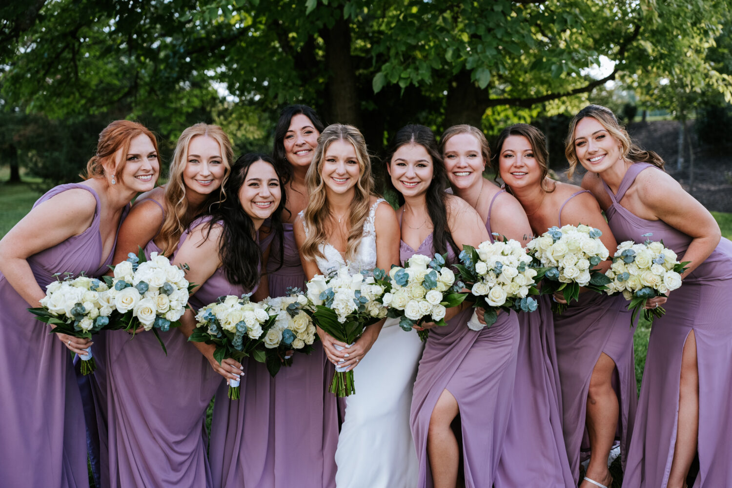 bridesmaids smiling with the bride 