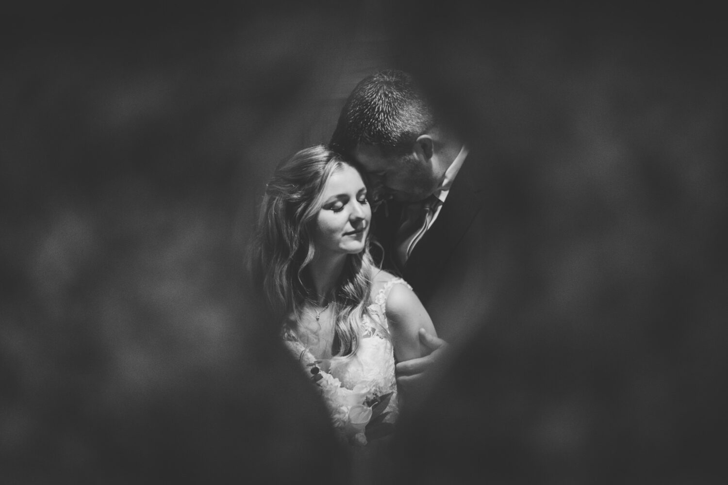 creative mirror portrait of the bride and groom on their Sweeney Barn wedding day