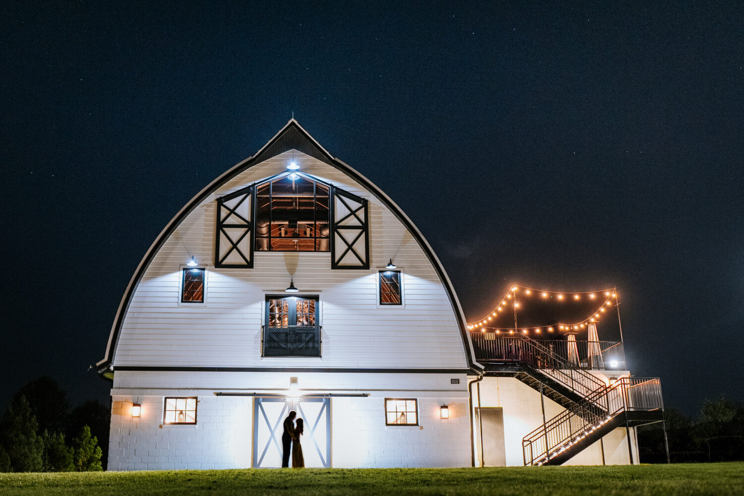 wedding day night portrait taken at Sweeney Barn in Manassas Virginia