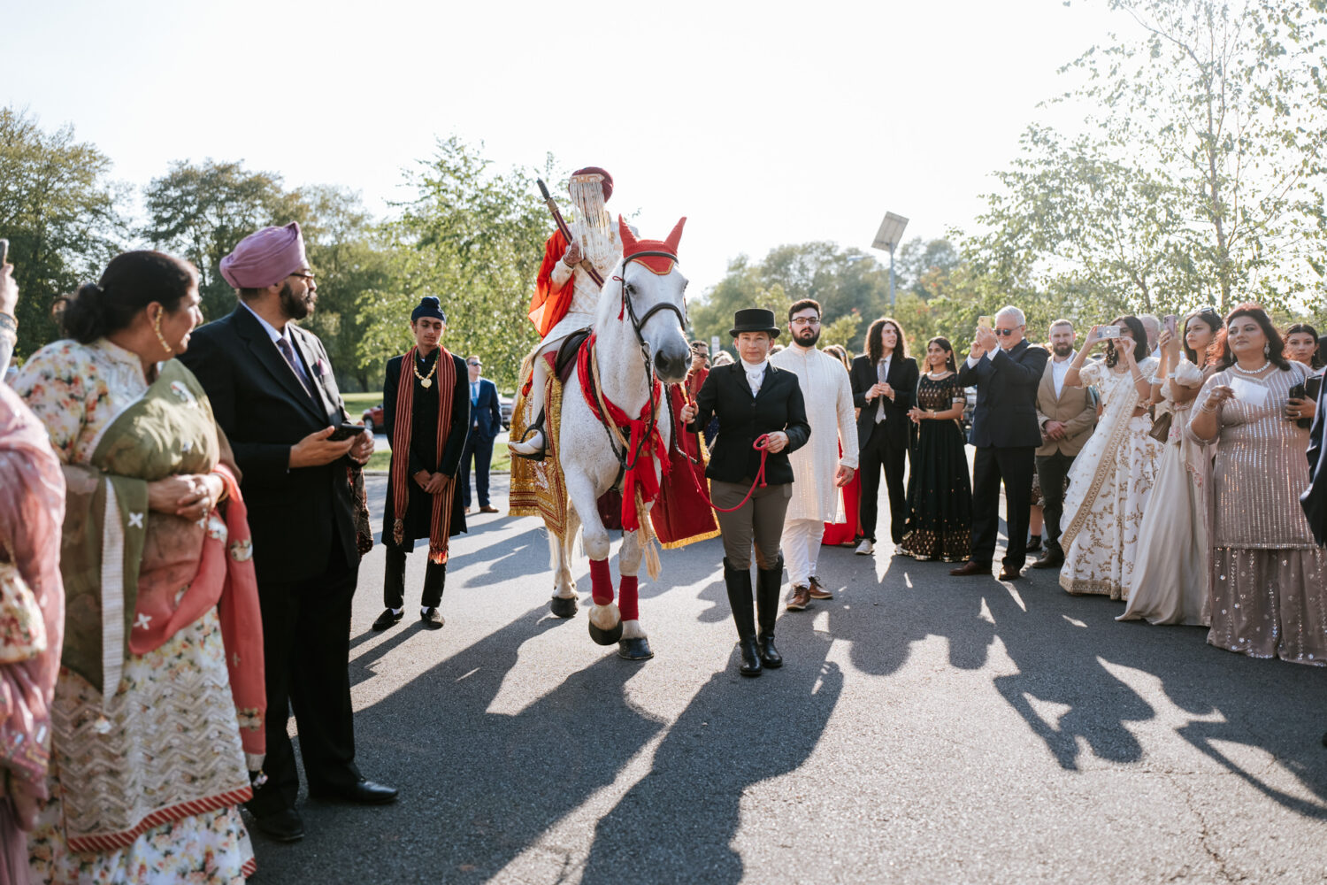 indian groom riding on a horse during his indian wedding day