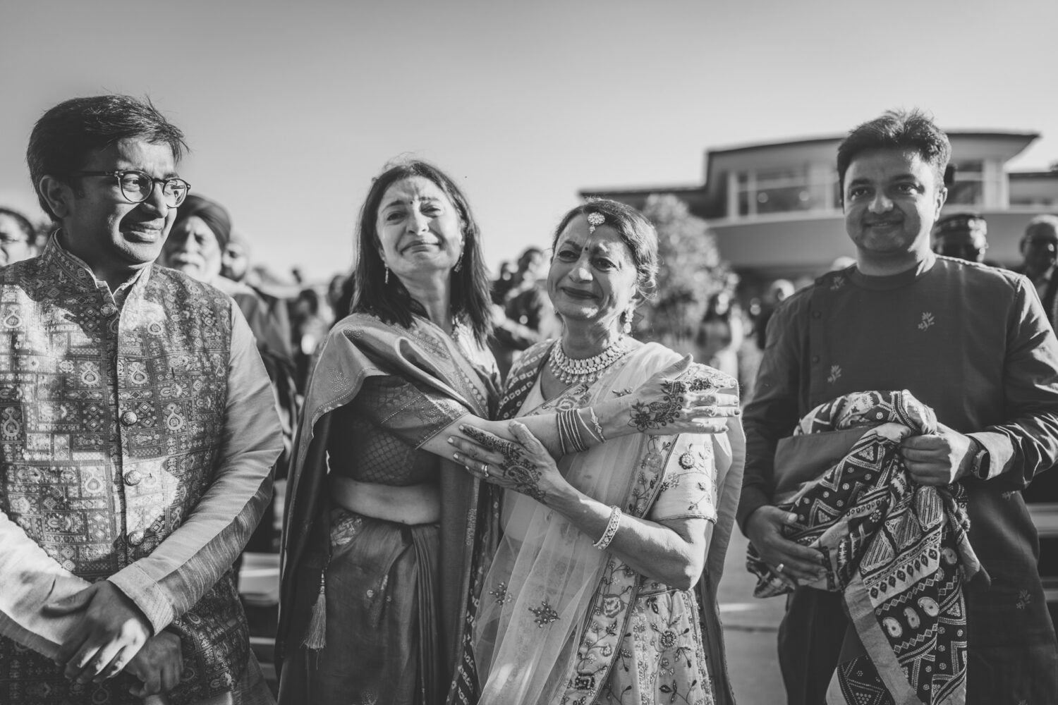 family of the bride crying during the bride's hindu wedding ceremony