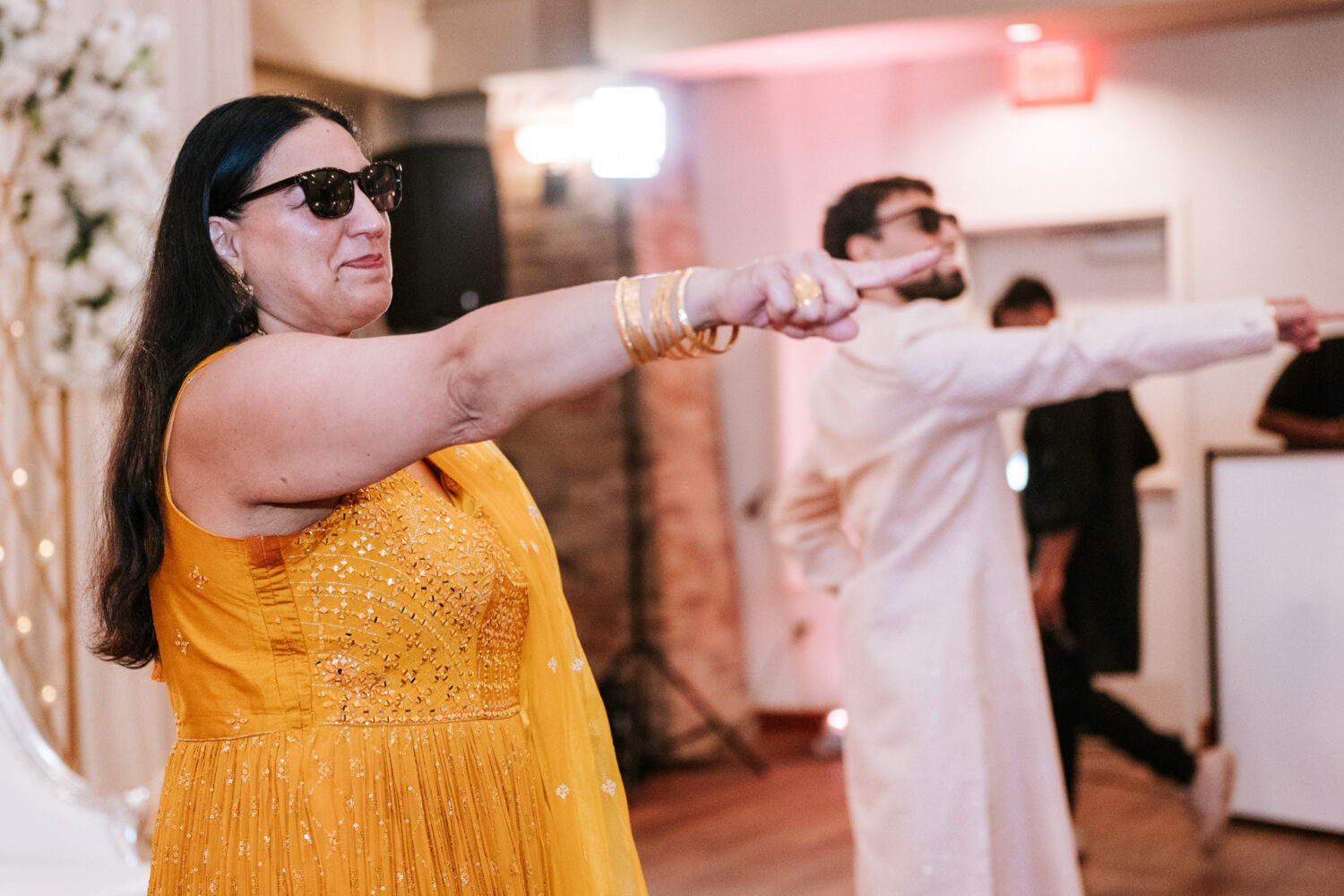 mother of the groom smiling during the mother and son dance