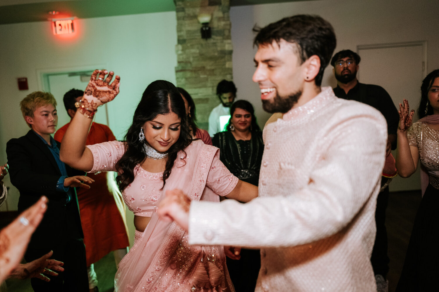 bride and groom dancing together on the dance floor