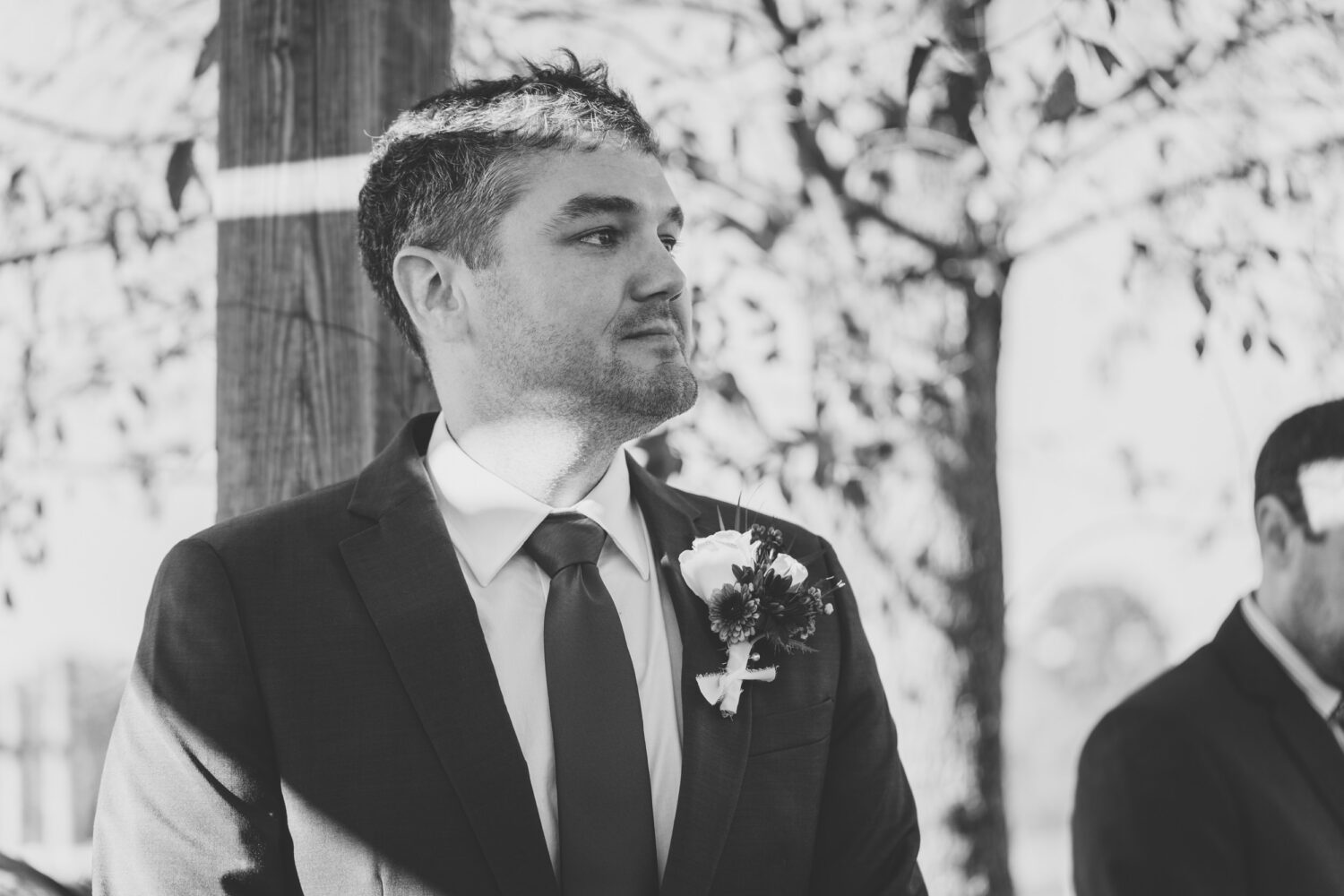 groom on the verge of tears after seeing his bride walk down the aisle