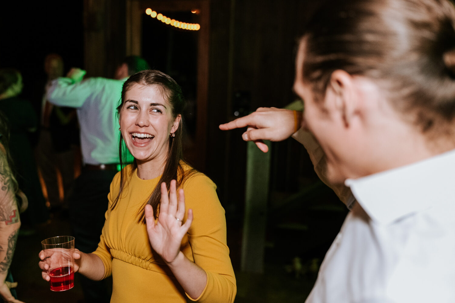 wedding guests having fun while dancing on the dance floor