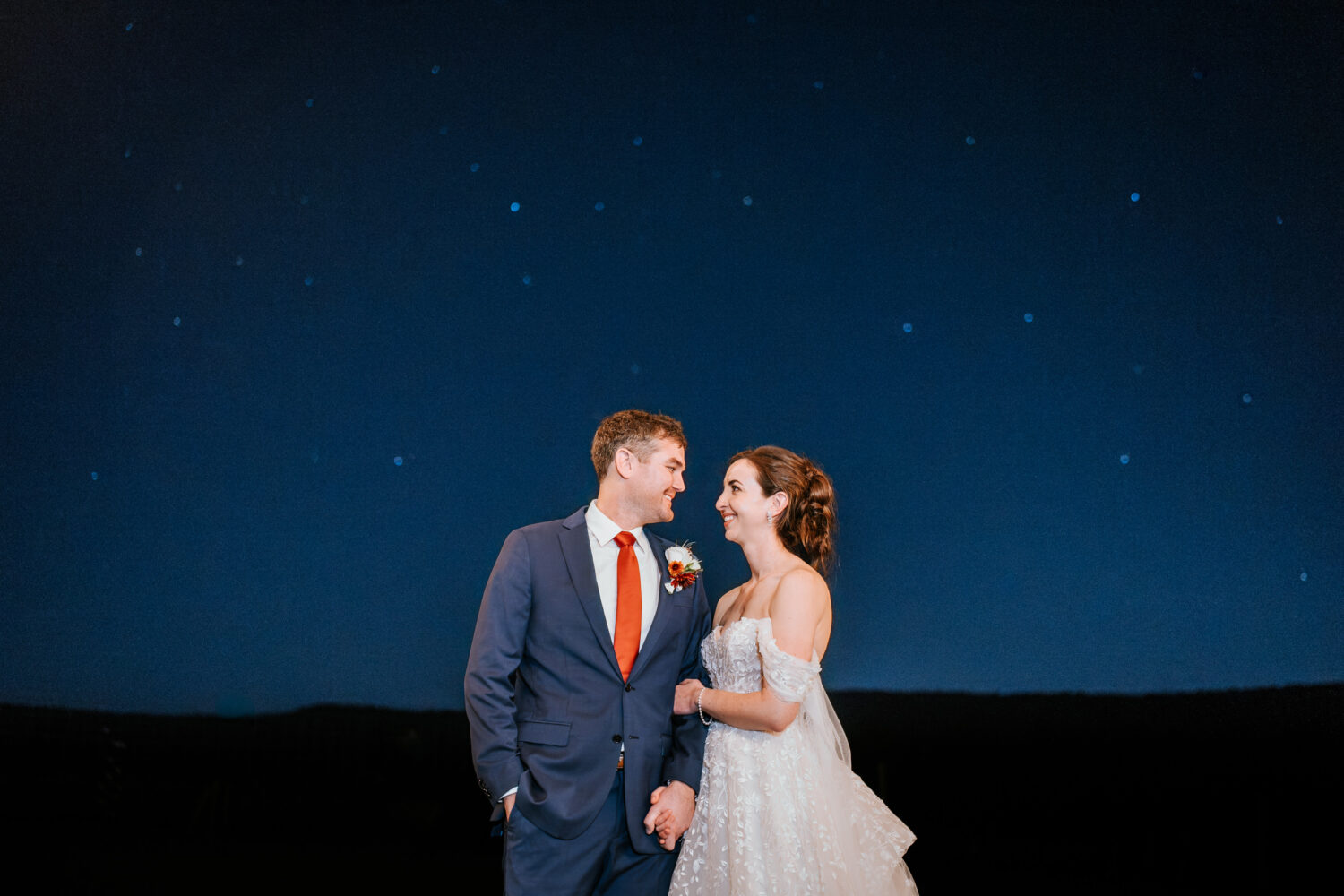 night portrait with the stars in the background during a Kalero Vineyard wedding day