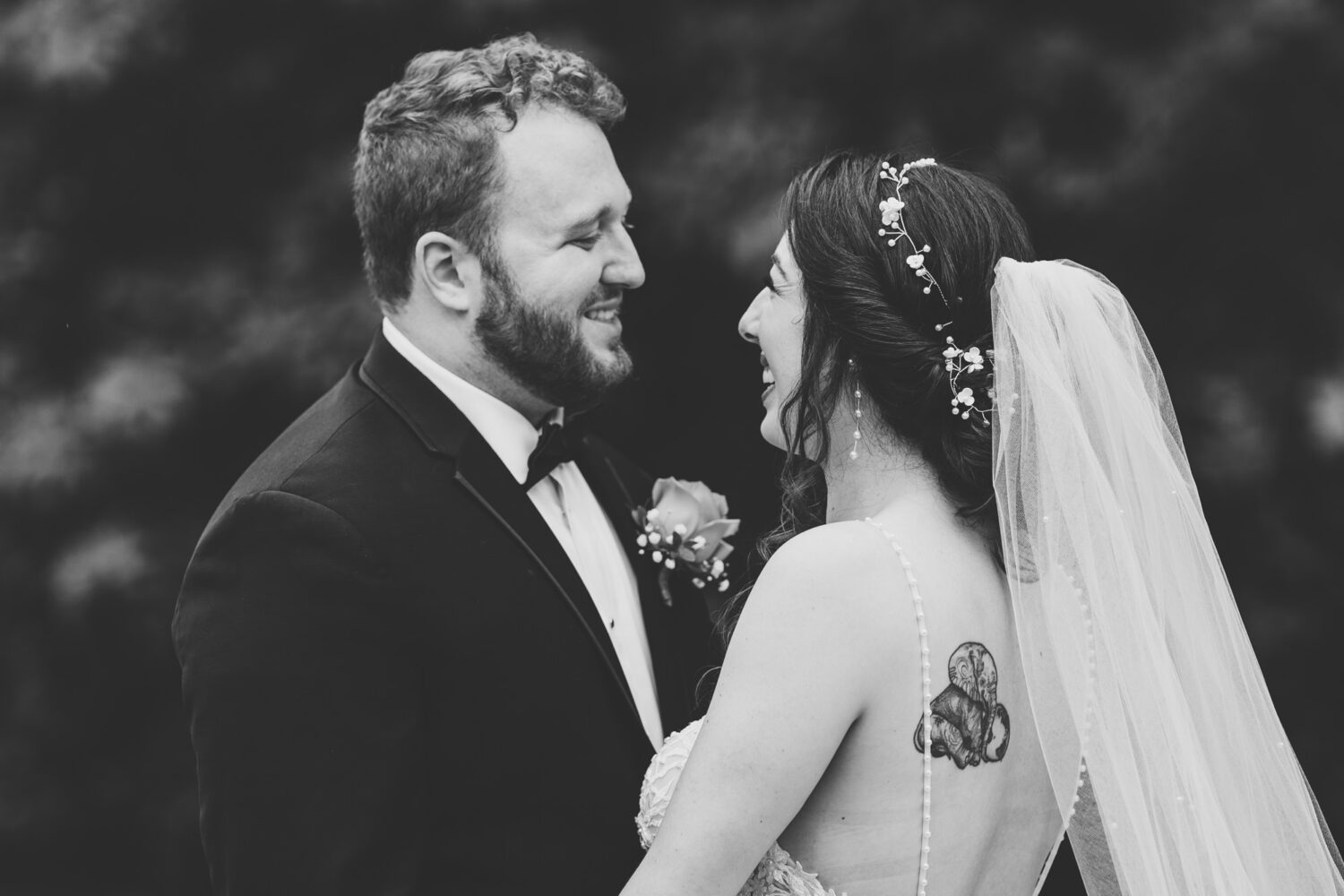 groom smiling while seeing his bride for the first time on their northern virginia wedding day