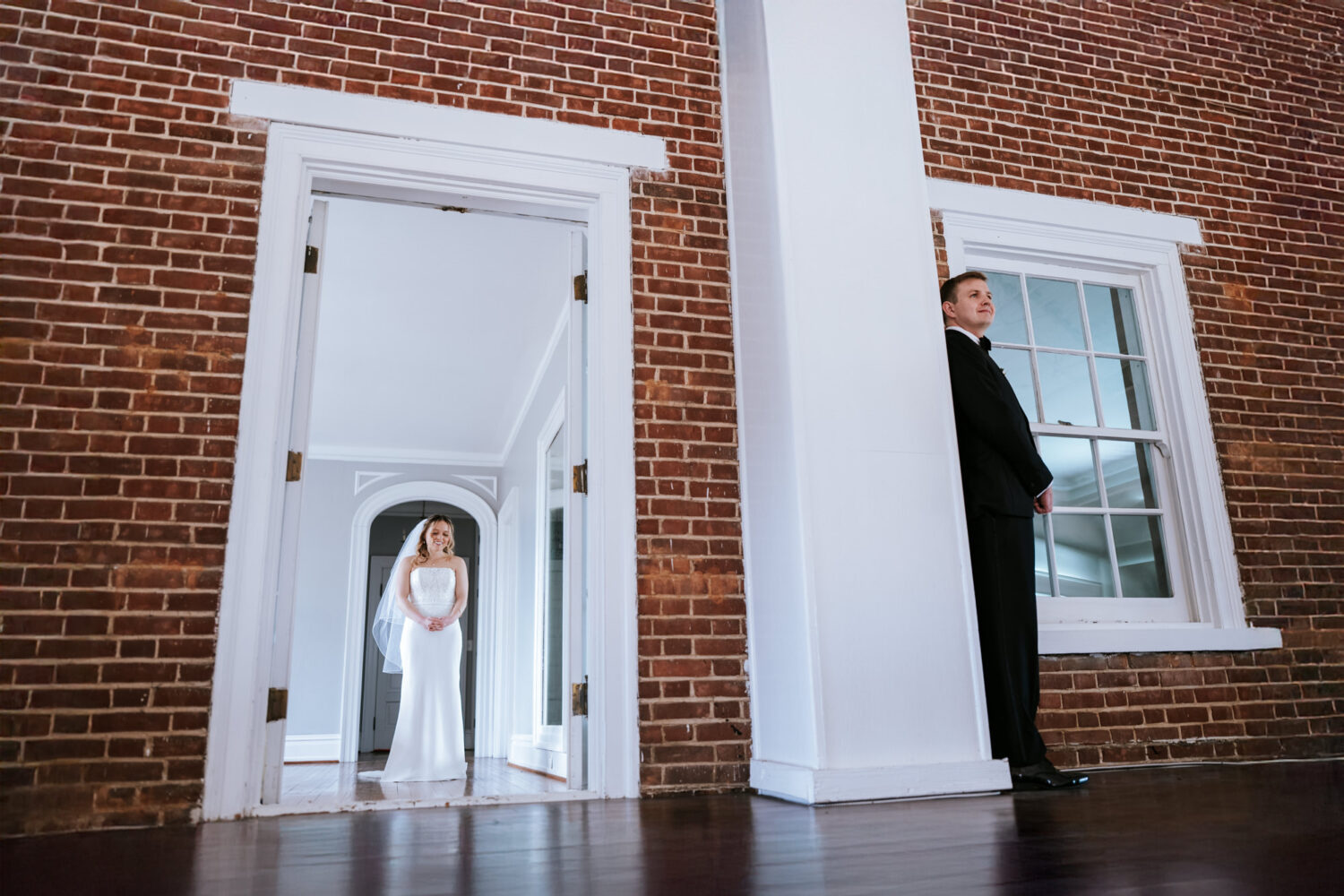 bride and groom prepping for their first touch