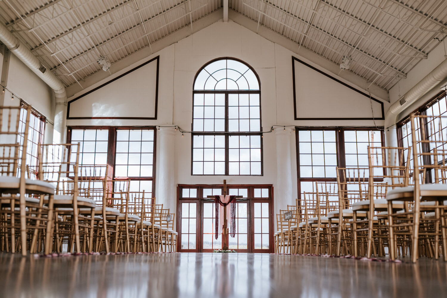 raspberry plain manor indoor wedding ceremony image