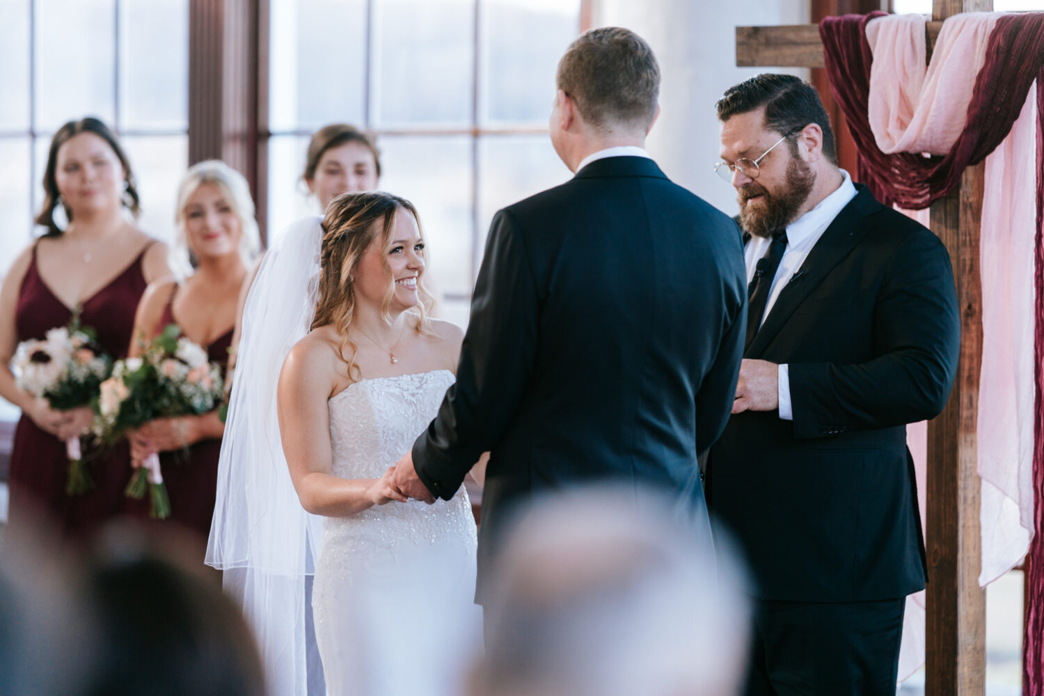 bride laughing during her ceremony