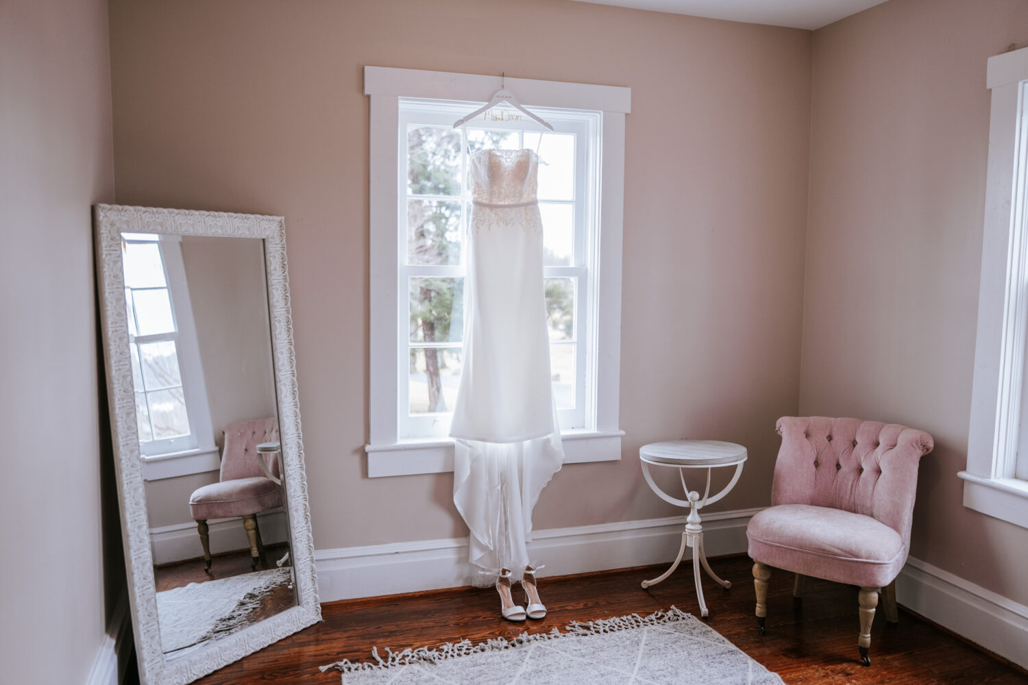 wedding dress photo in an empty room